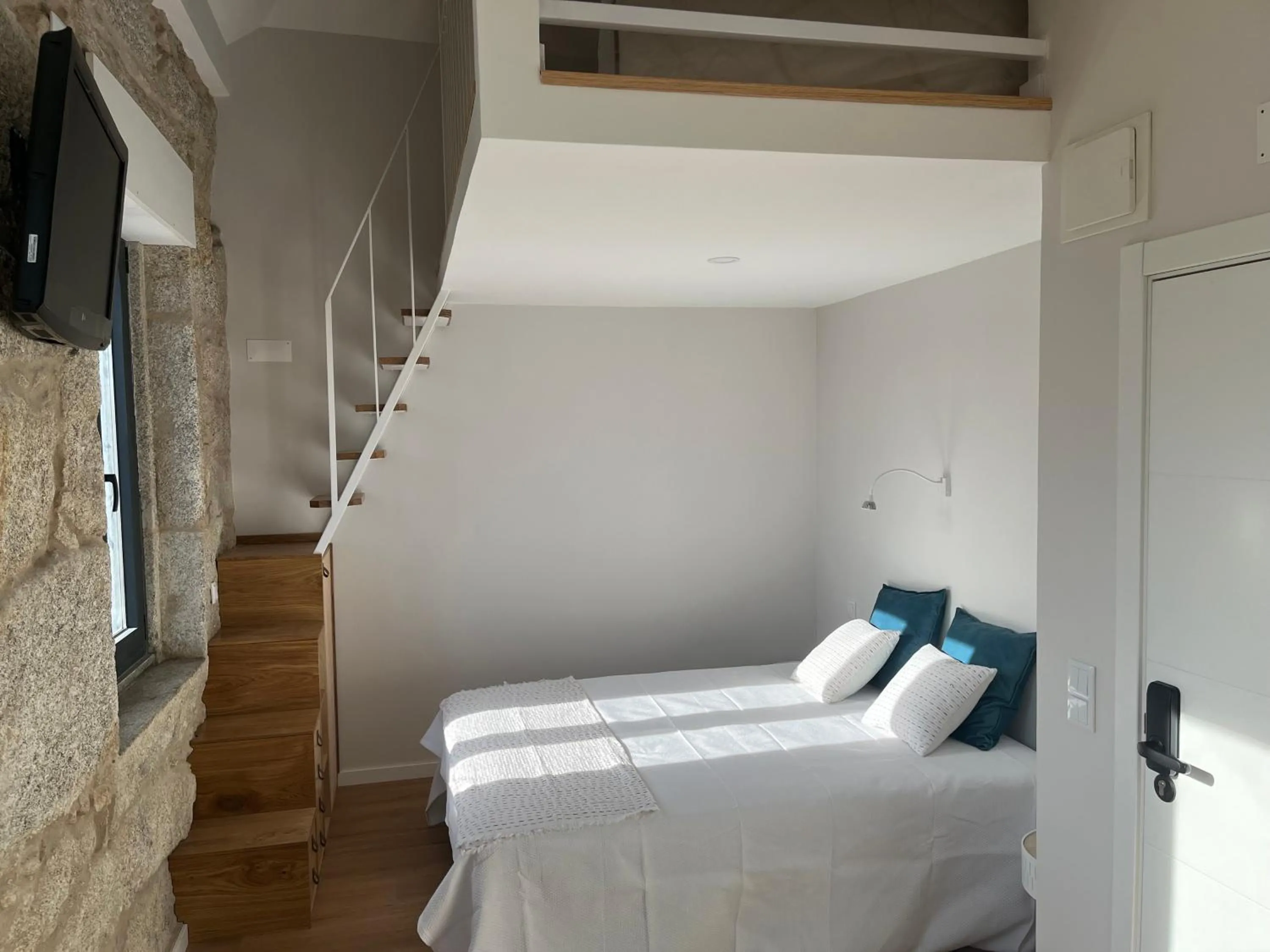 Bed in Ameixial Suites