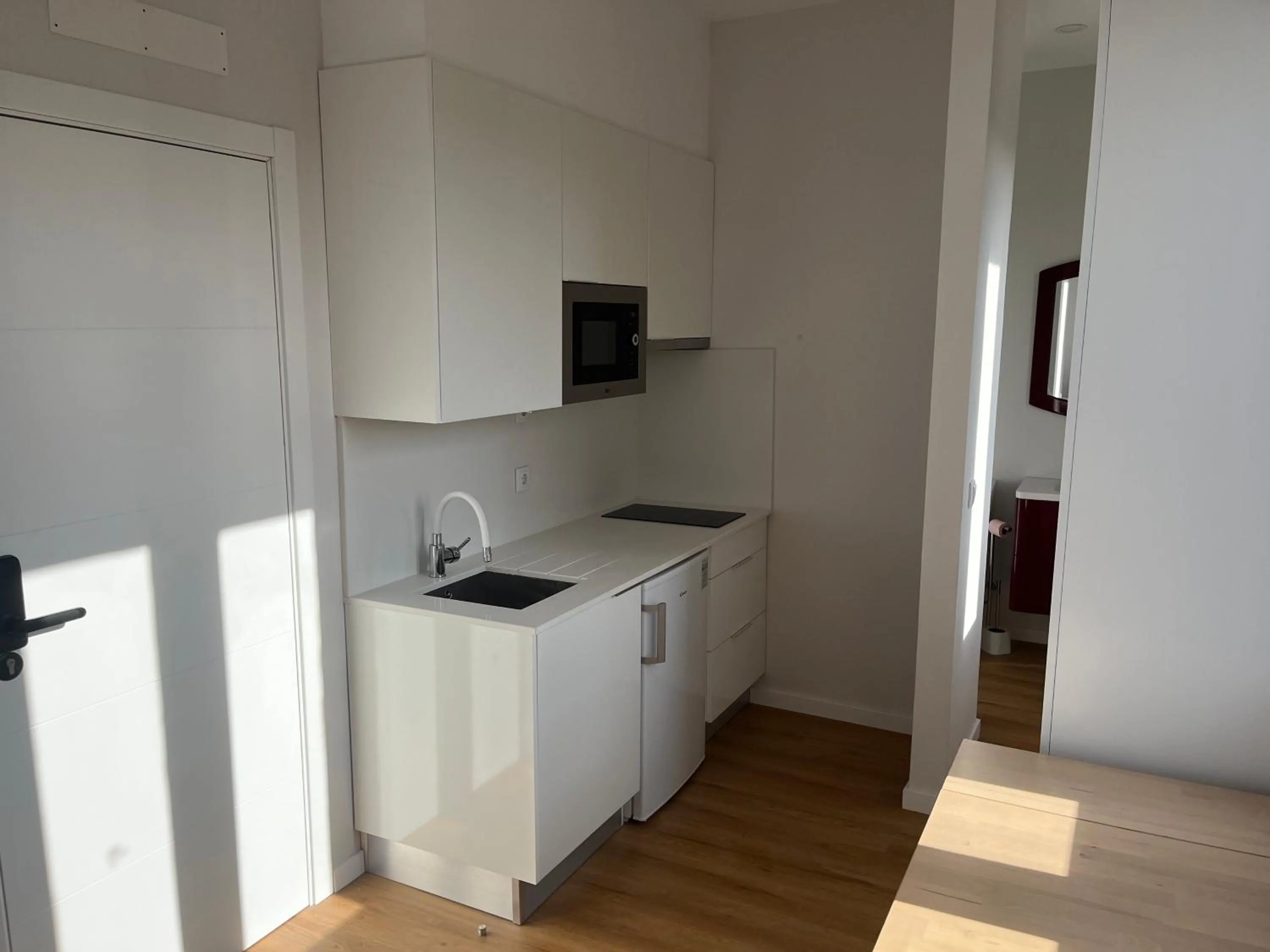 Kitchen or kitchenette in Ameixial Suites