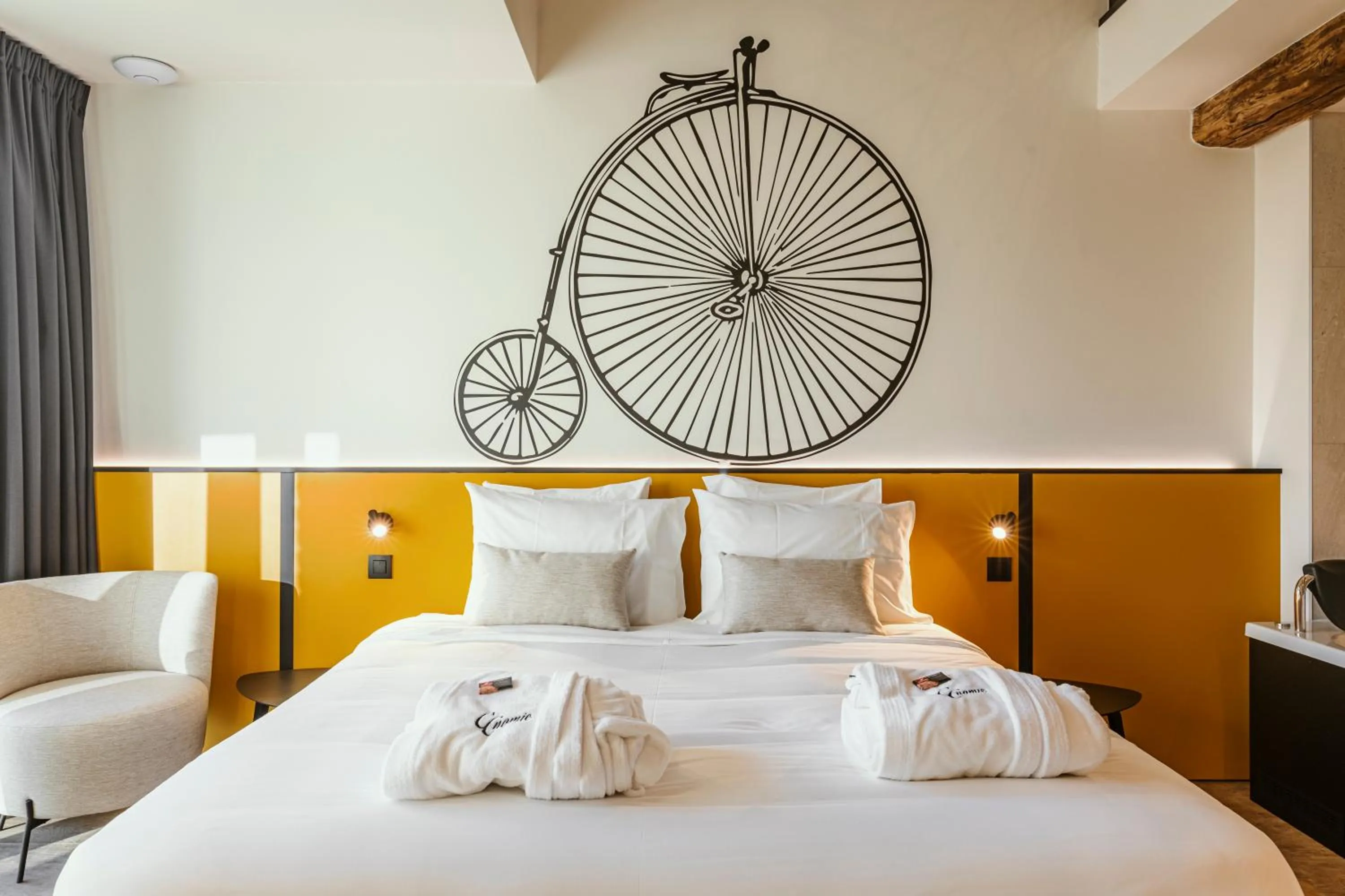 Bed in CC Nomie Hôtel Restaurant