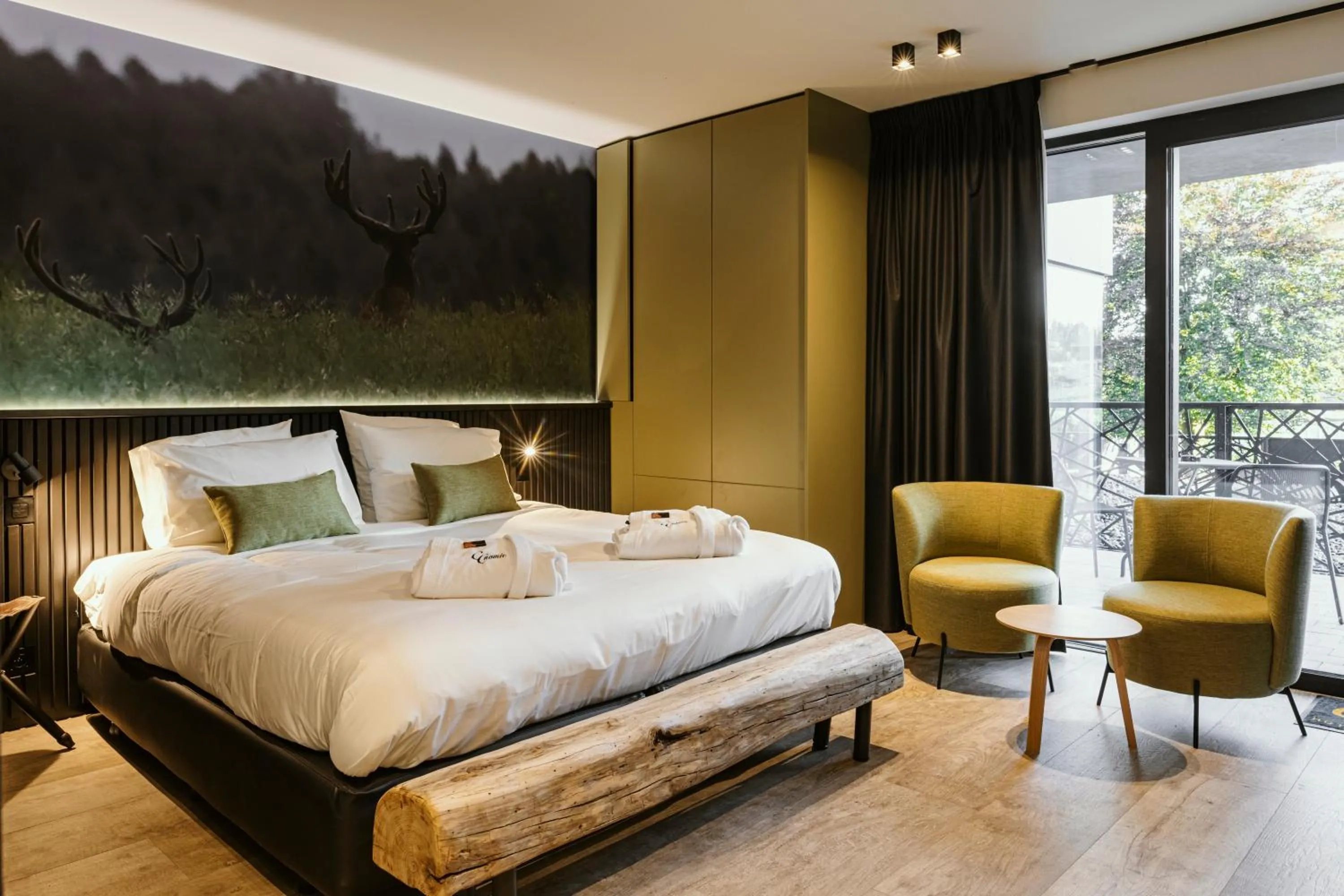 Bed in CC Nomie Hôtel Restaurant