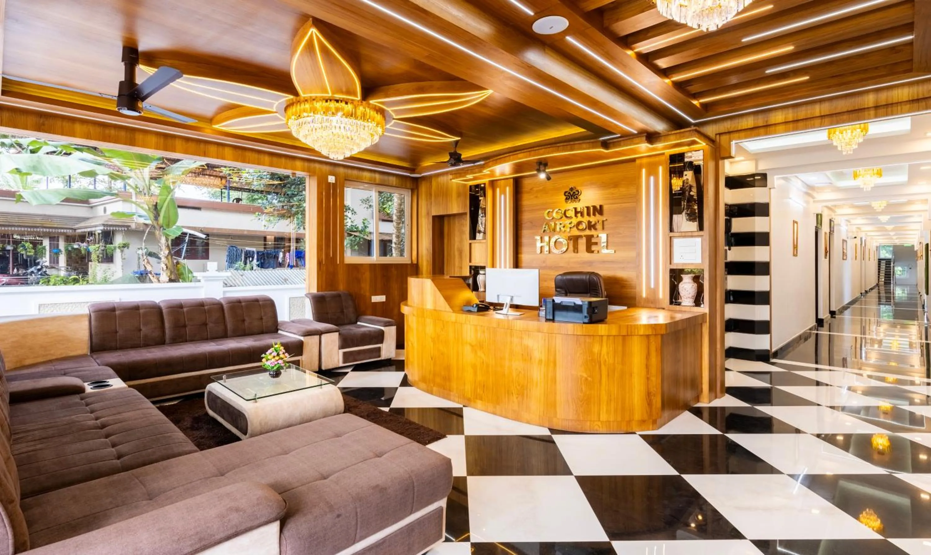 Lobby or reception in Treebo Premium Cochin Airport, 5 min From Cochin Airport