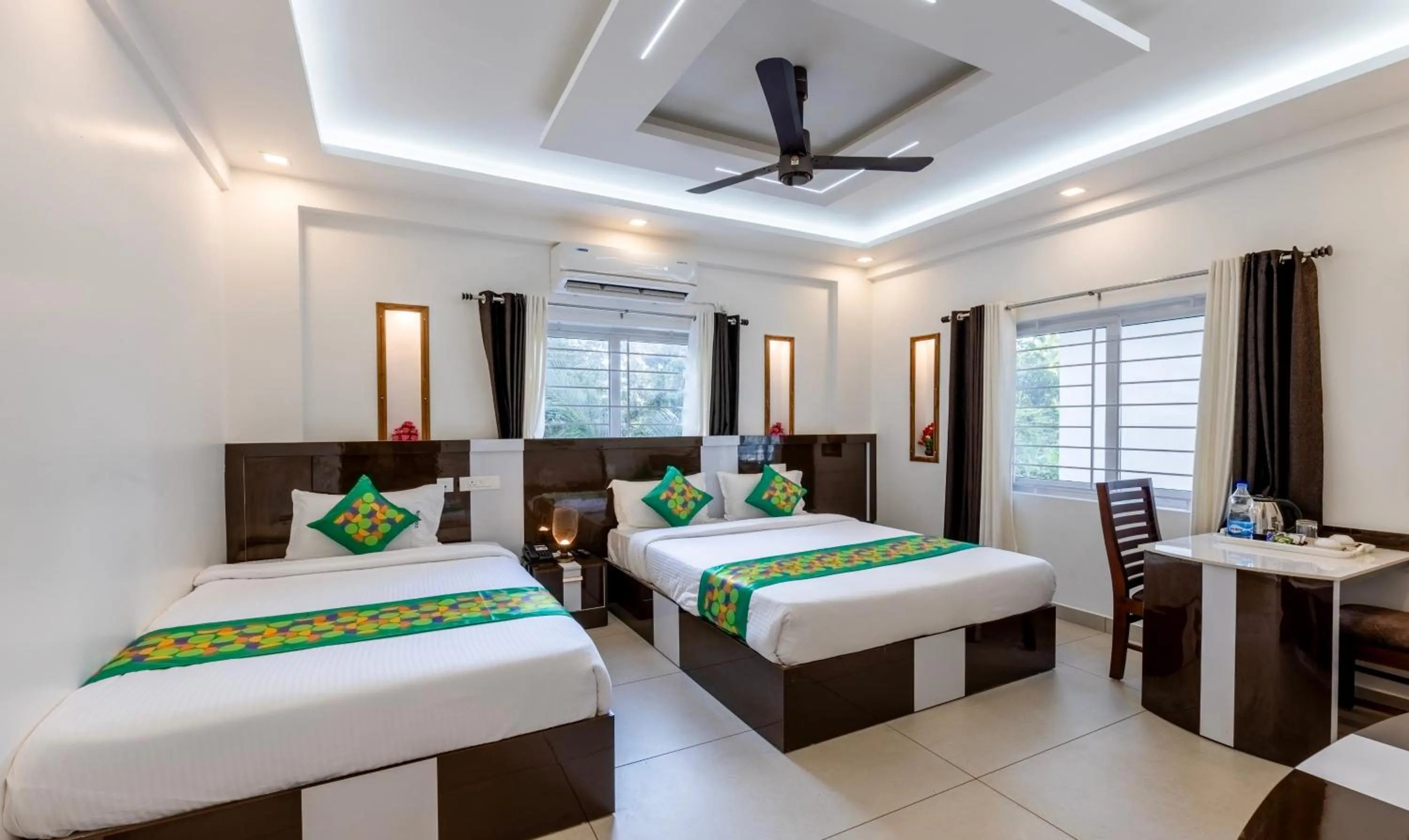 Bedroom, Bed in Treebo Premium Cochin Airport, 5 min From Cochin Airport