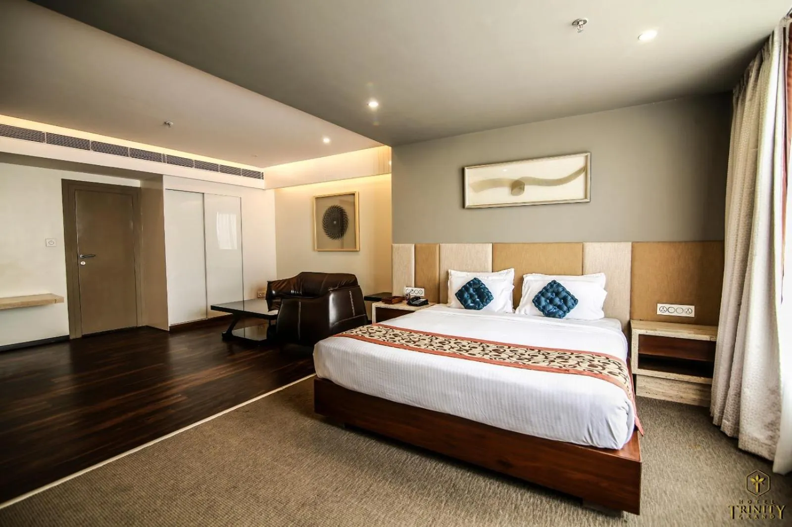 Bedroom, Bed in Hotel Trinity Grand, Raigarh