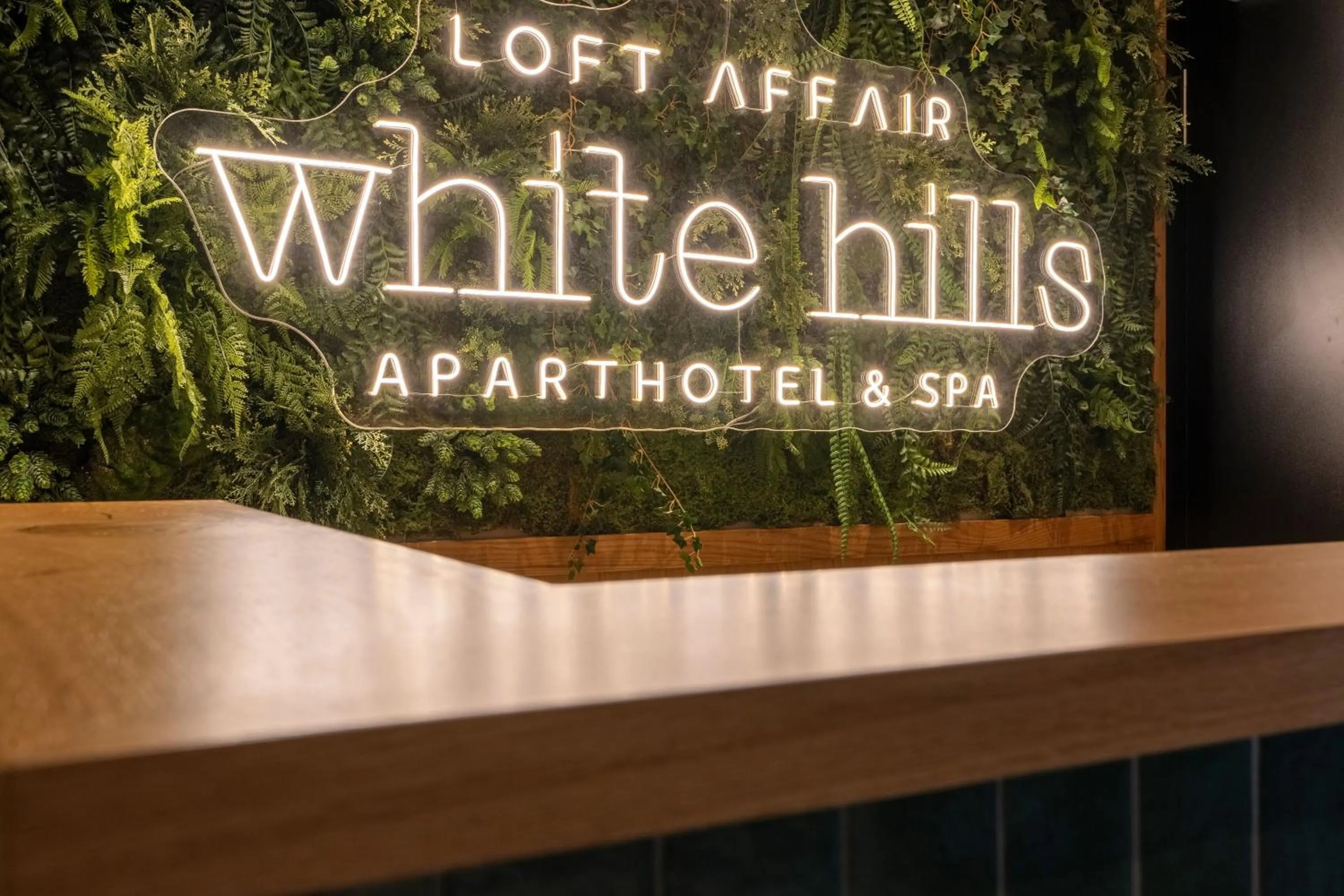 Property logo or sign in White Hills - LoftAffair Spa Collection