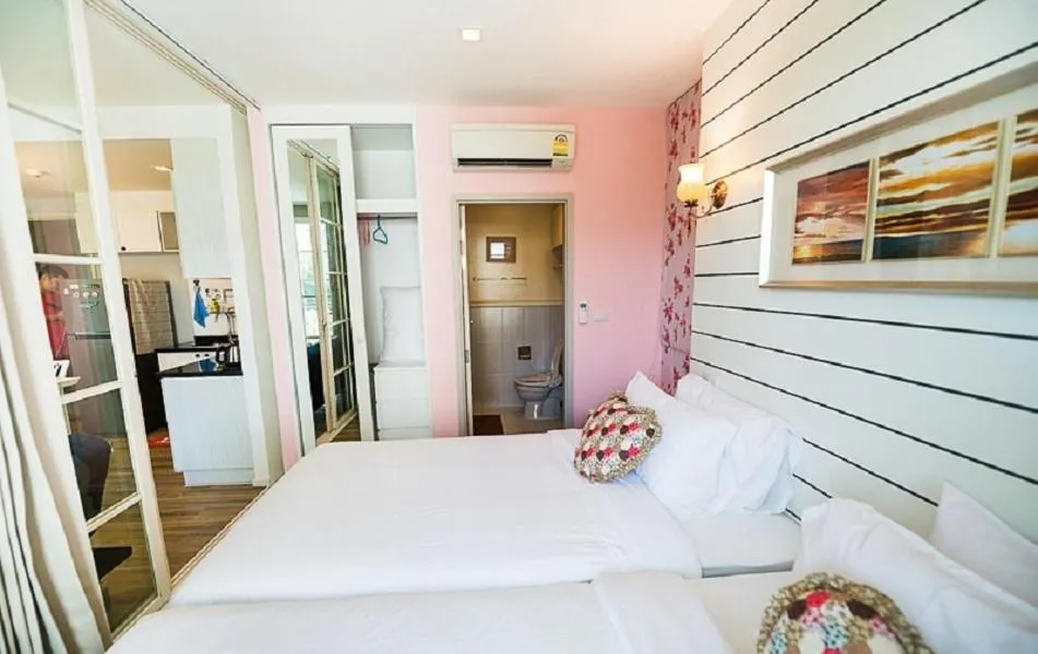 Bed in Summer Huahin Condo 2 Bedrooms Pool View Classic Room