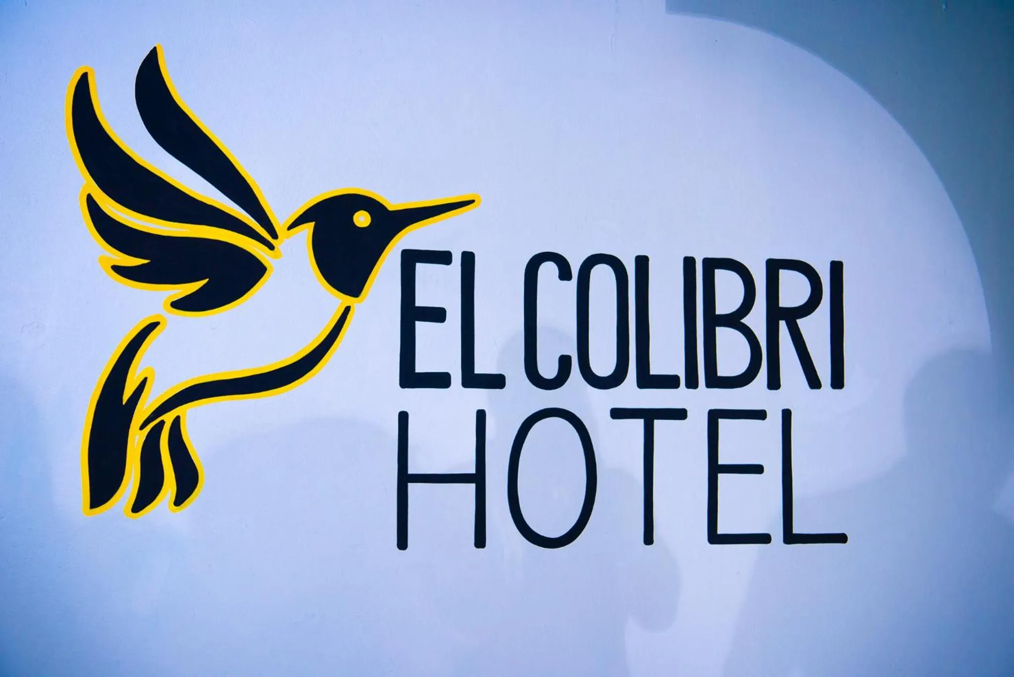 Property logo or sign in El Colibri Hotel