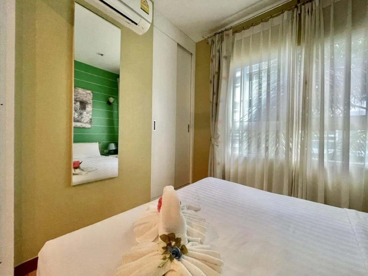 Bed in The trust huahin resort condo greeny room