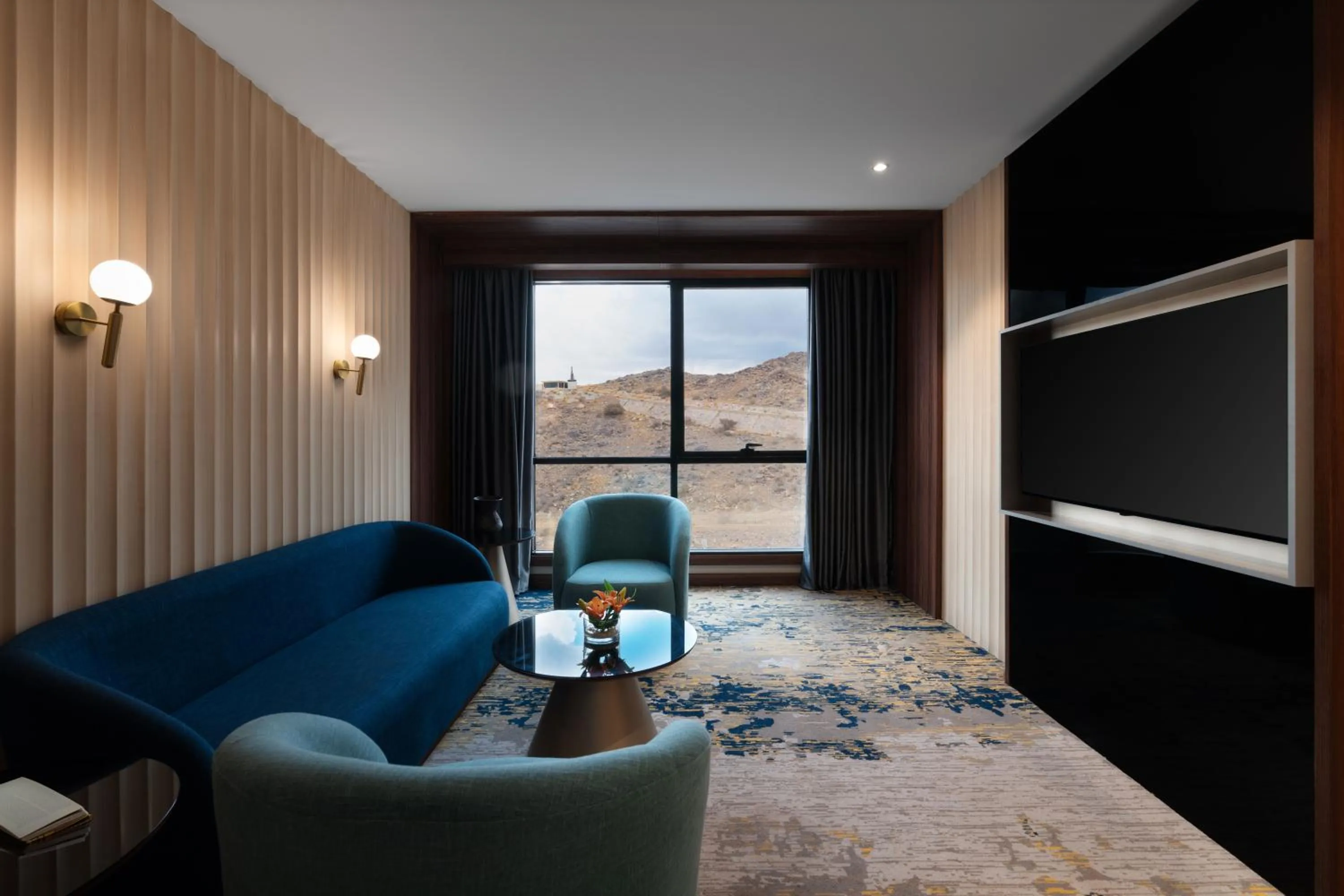 Living room in Warwick Al Taif Hotel