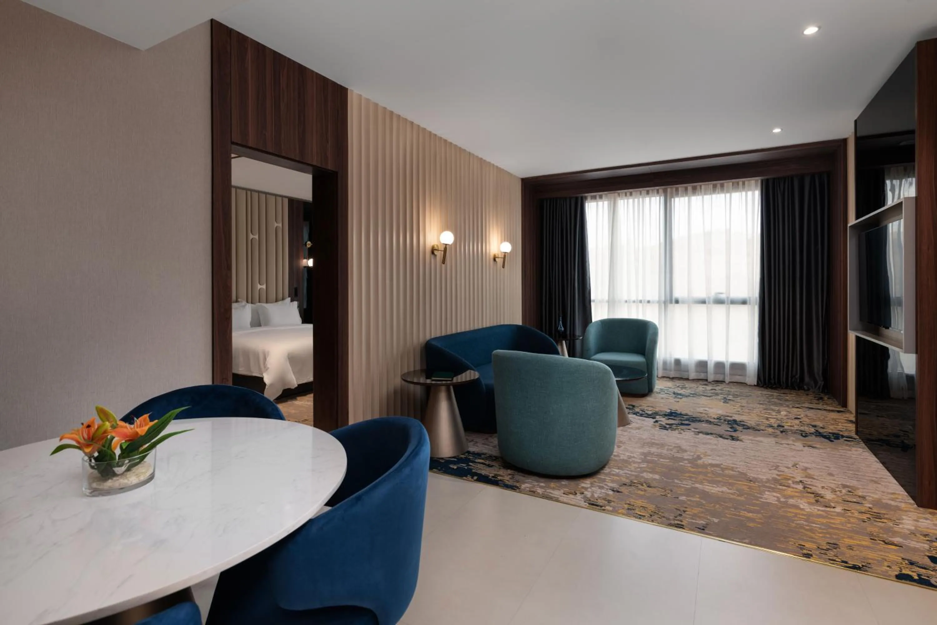 Living room in Warwick Al Taif Hotel