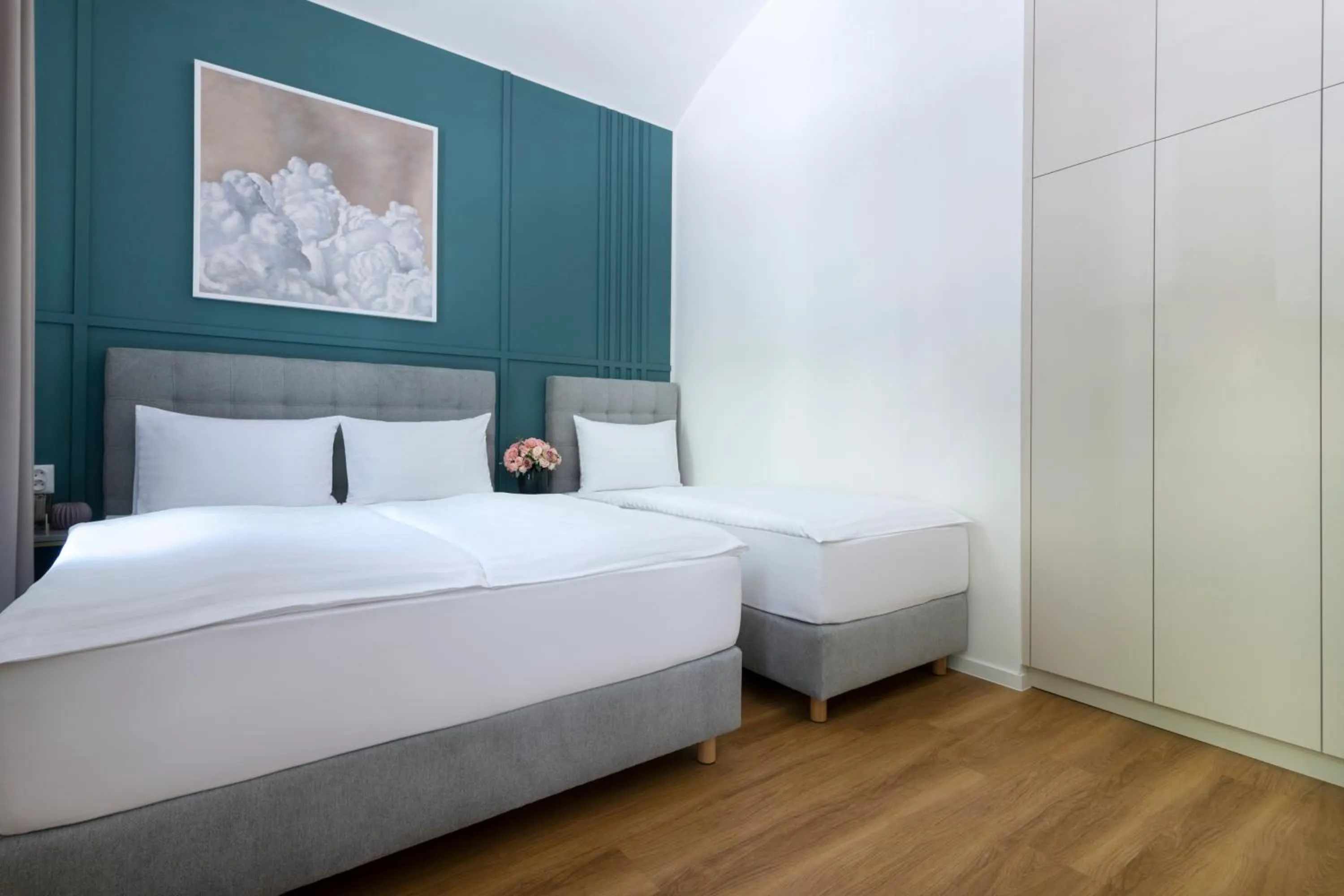 Bed in Encore Boutique Residence by Dwellfort