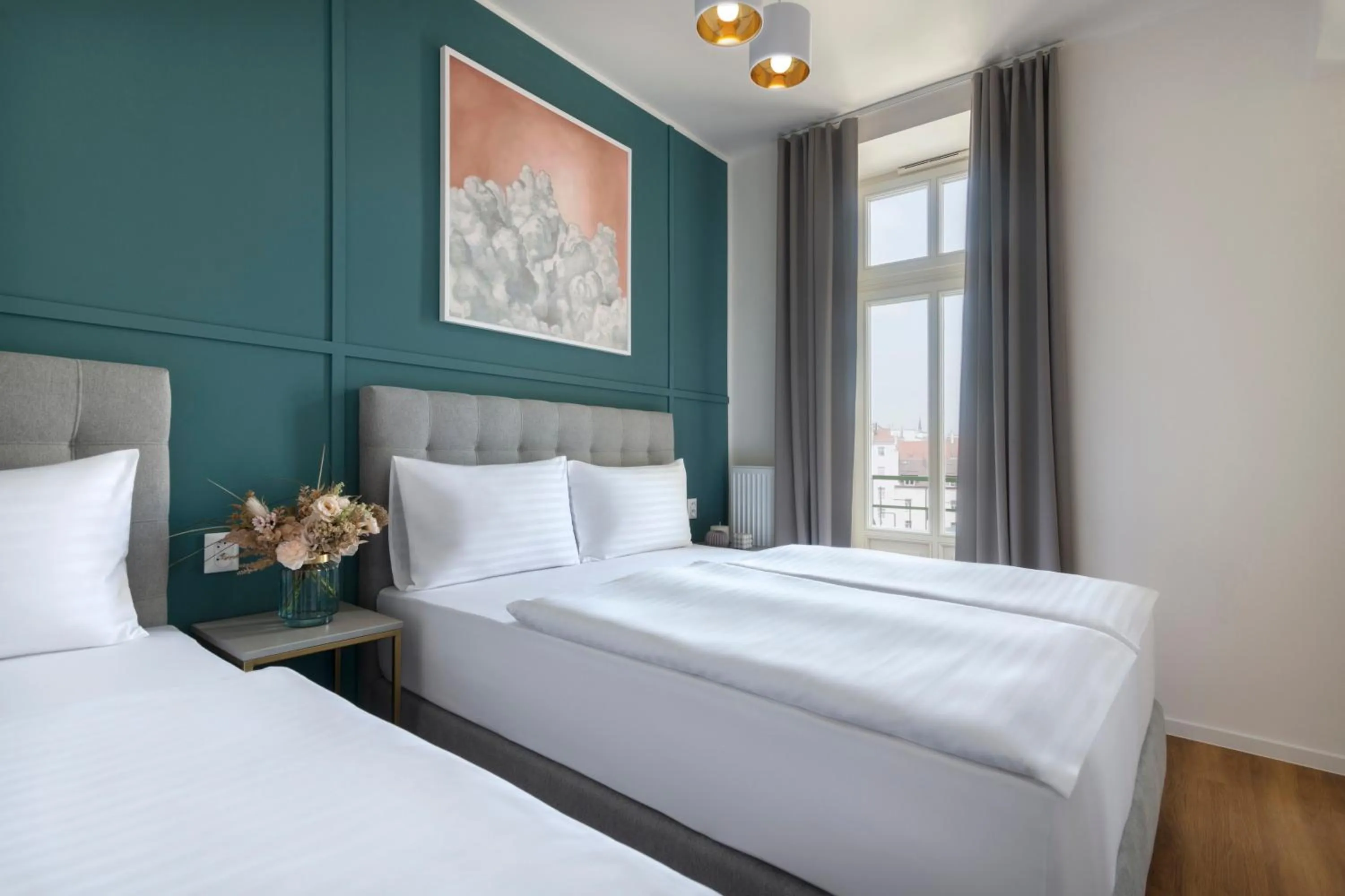 Bed in Encore Boutique Residence by Dwellfort