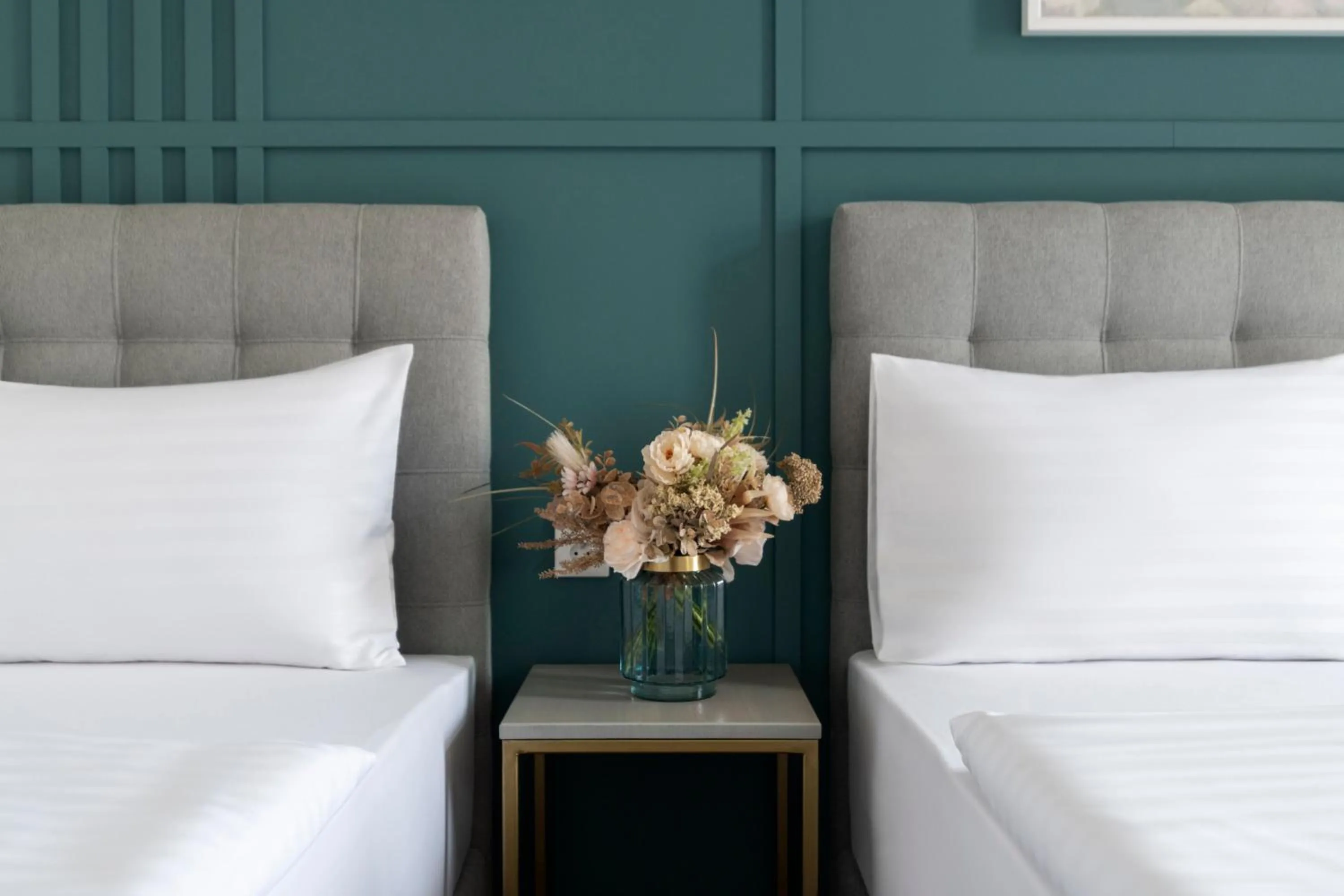 Bed in Encore Boutique Residence by Dwellfort