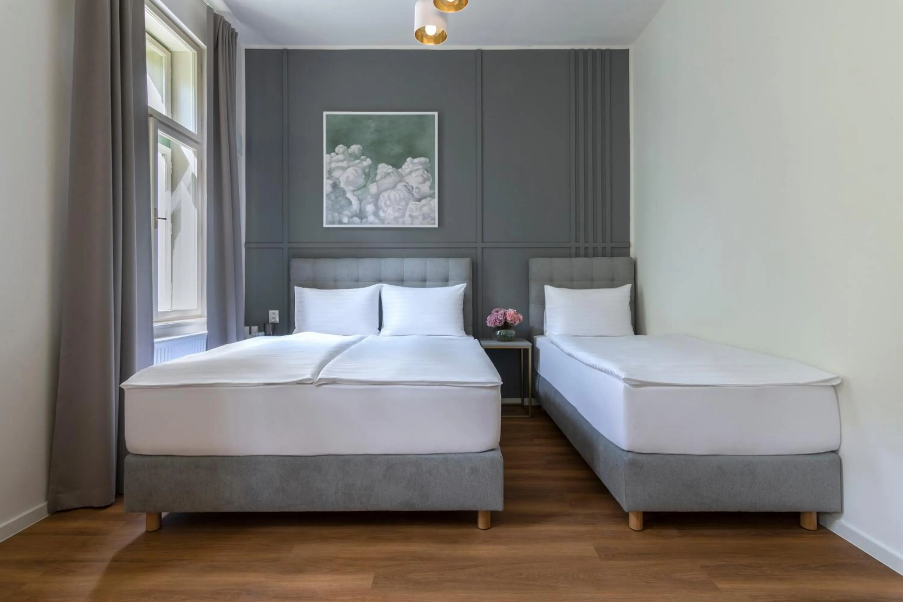 Bed in Encore Boutique Residence by Dwellfort