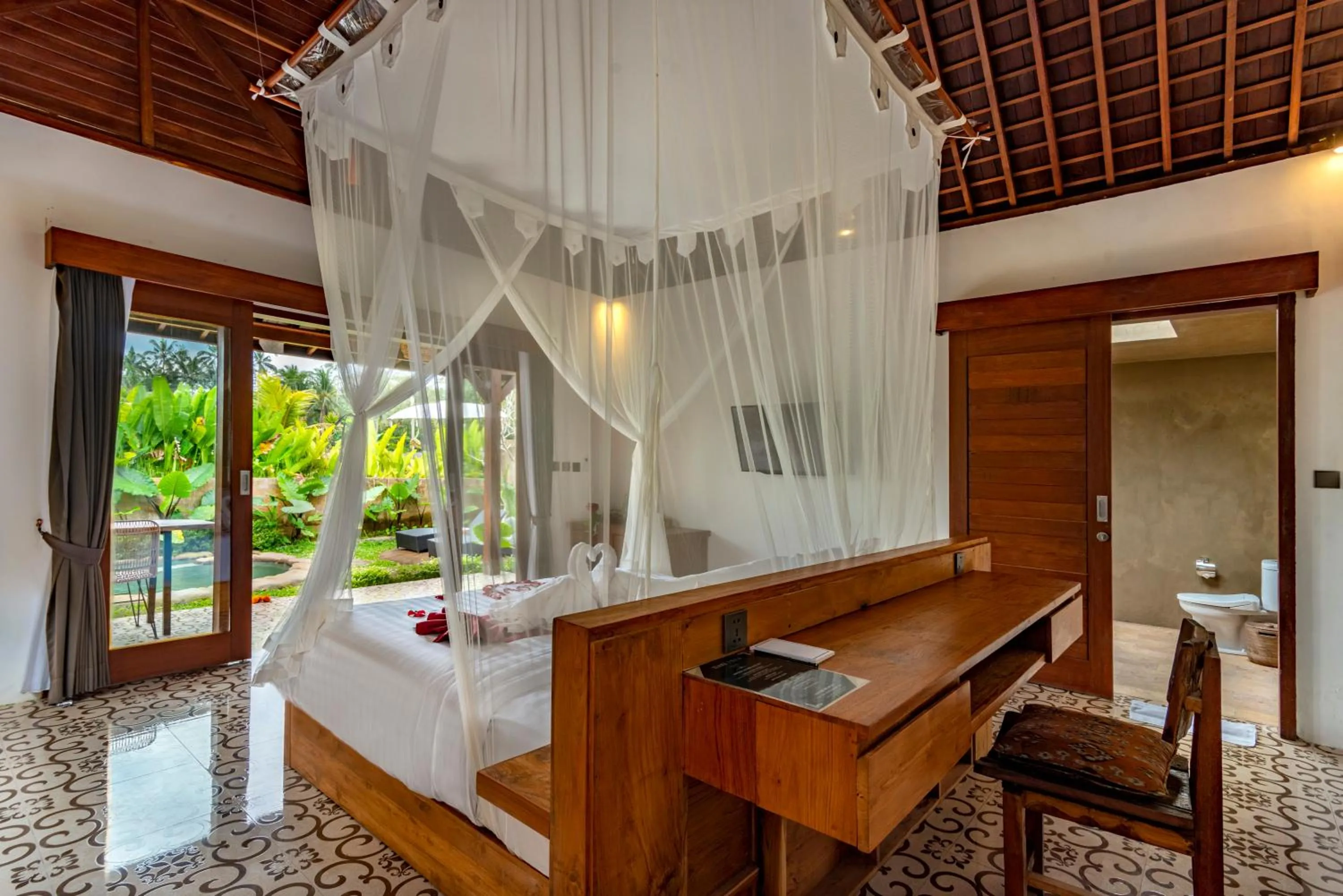 Bed in Tiare Villa Ubud by Dhananjaya Hospitality