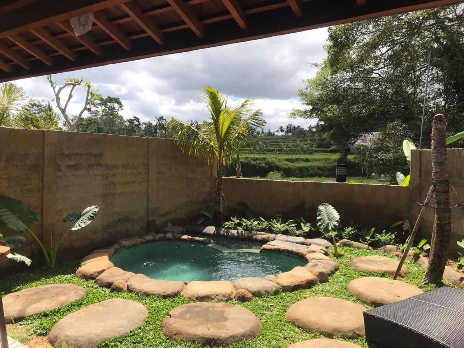 Swimming pool in Tiare Villa Ubud by Dhananjaya Hospitality