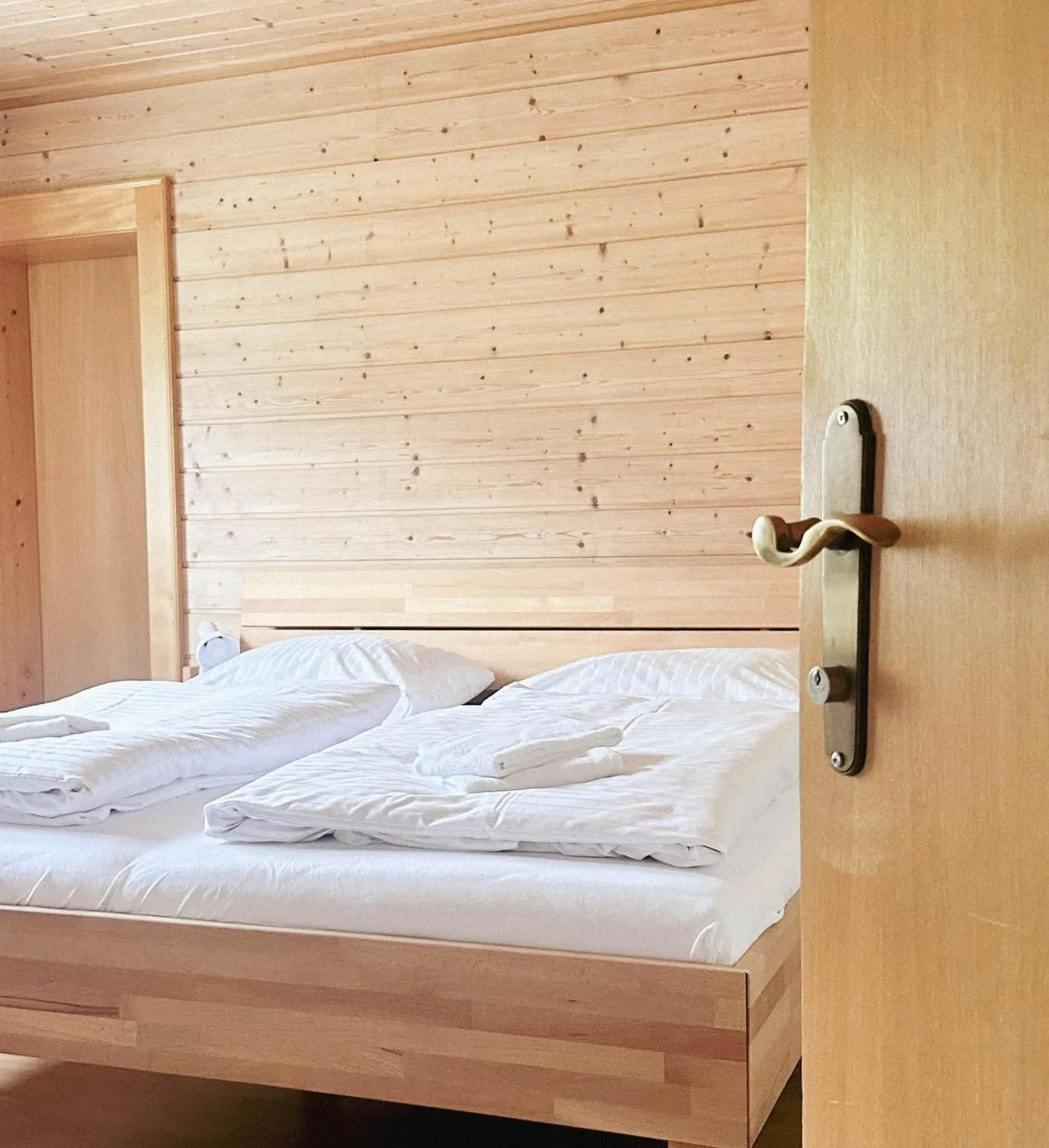 Photo of the whole room, Bed in s´Amagmach