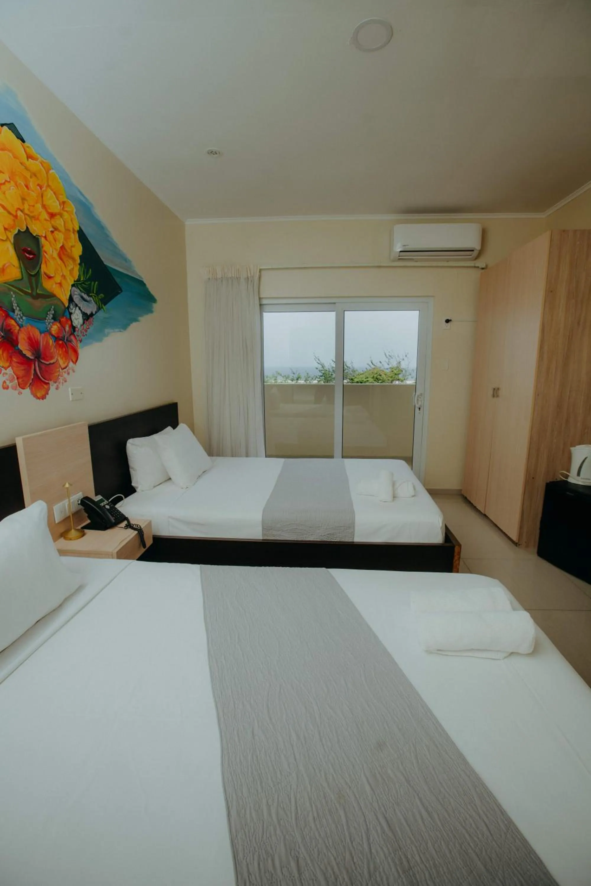 Bed in Curacao Airport Hotel