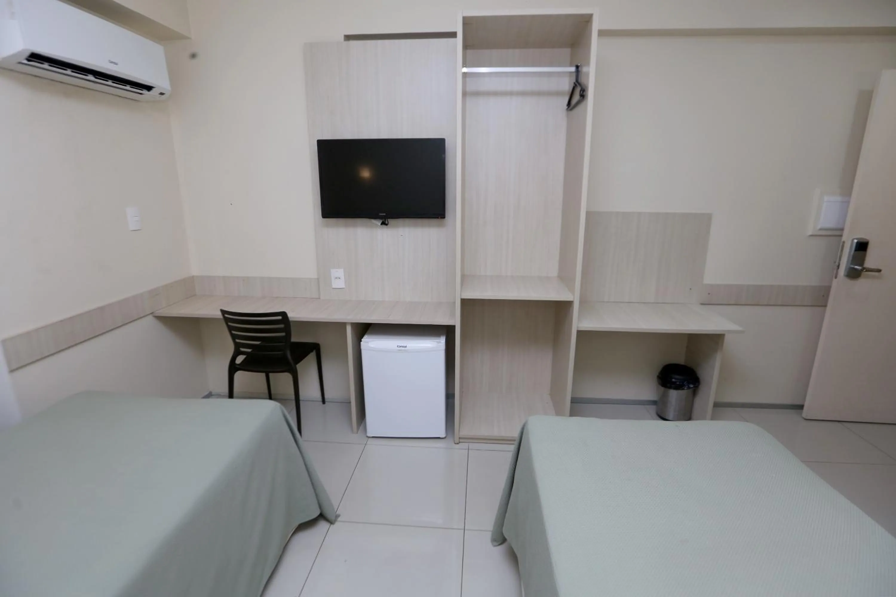 Bed in Stay Inn Hotel