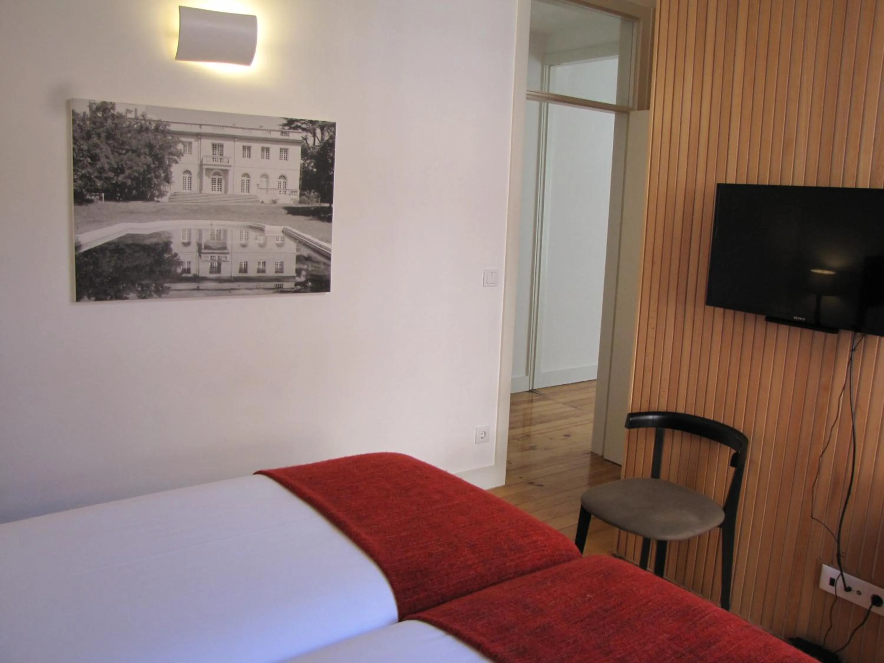 Seating area, Bed in Koolhouse Porto