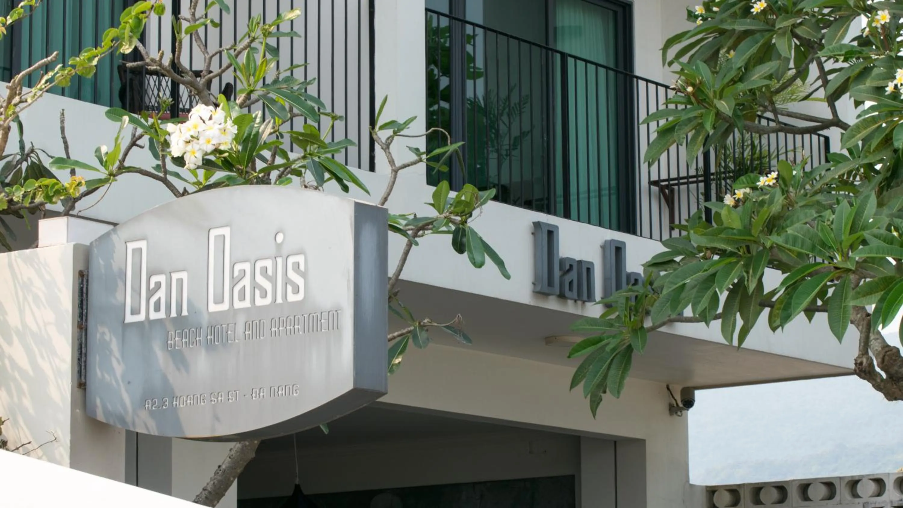 Property logo or sign in Dan Oasis Hotel and Apartment