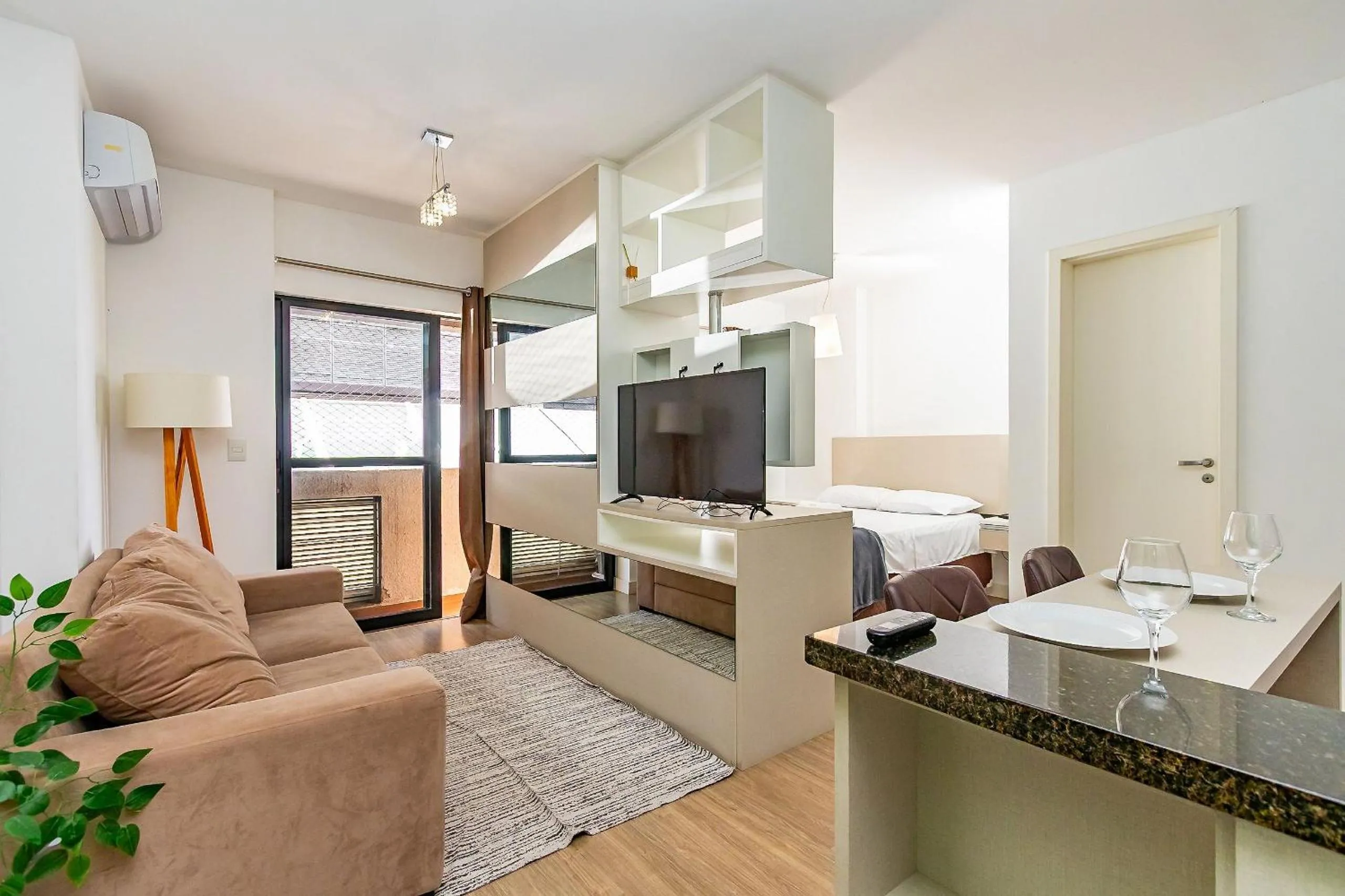 Living room in Apto em frente ao shopping com piscina aquecida