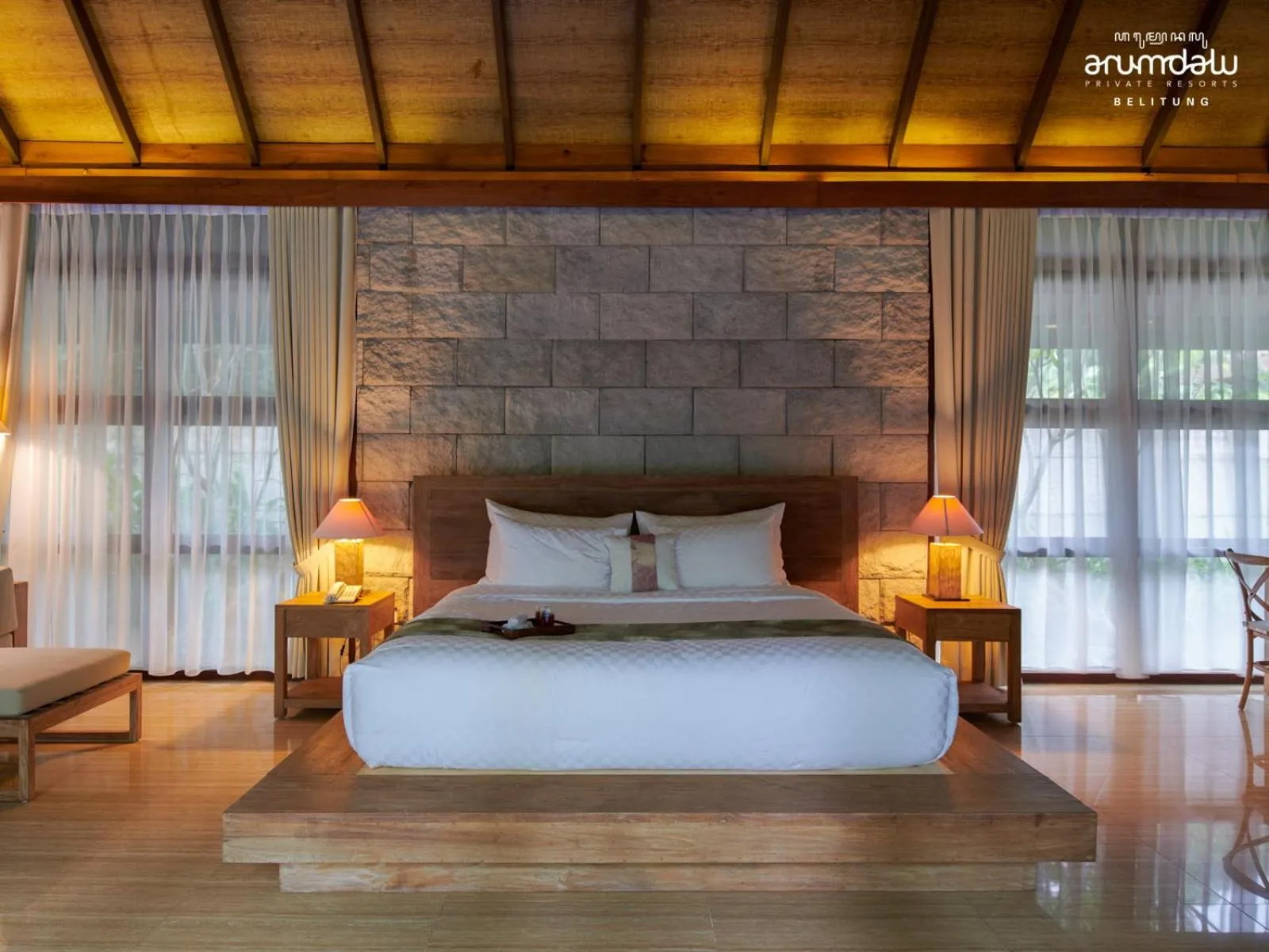 Bed in Arumdalu Private Resort