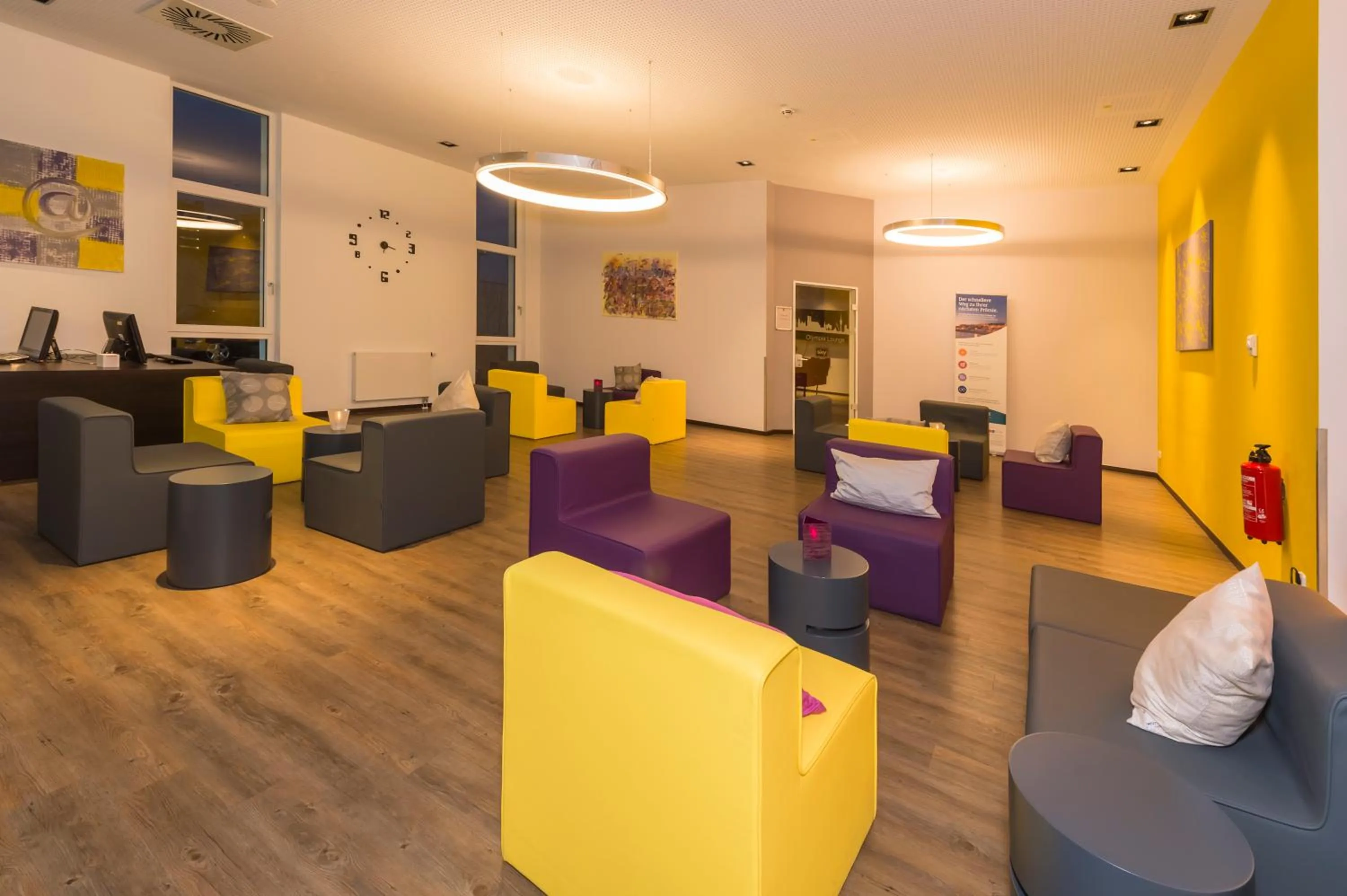 Communal lounge/ TV room in Star G Hotel Premium München Domagkstraße