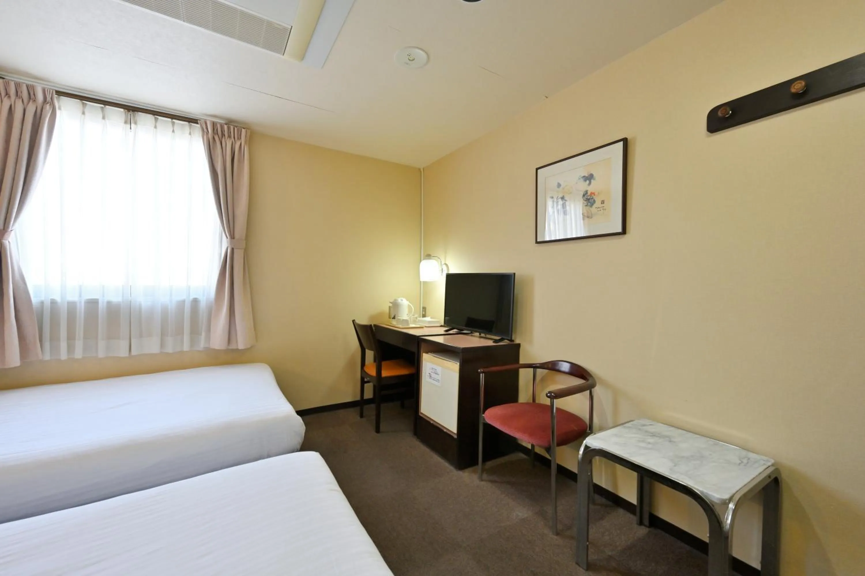 Bed in Wakayama Daini Fuji Hotel