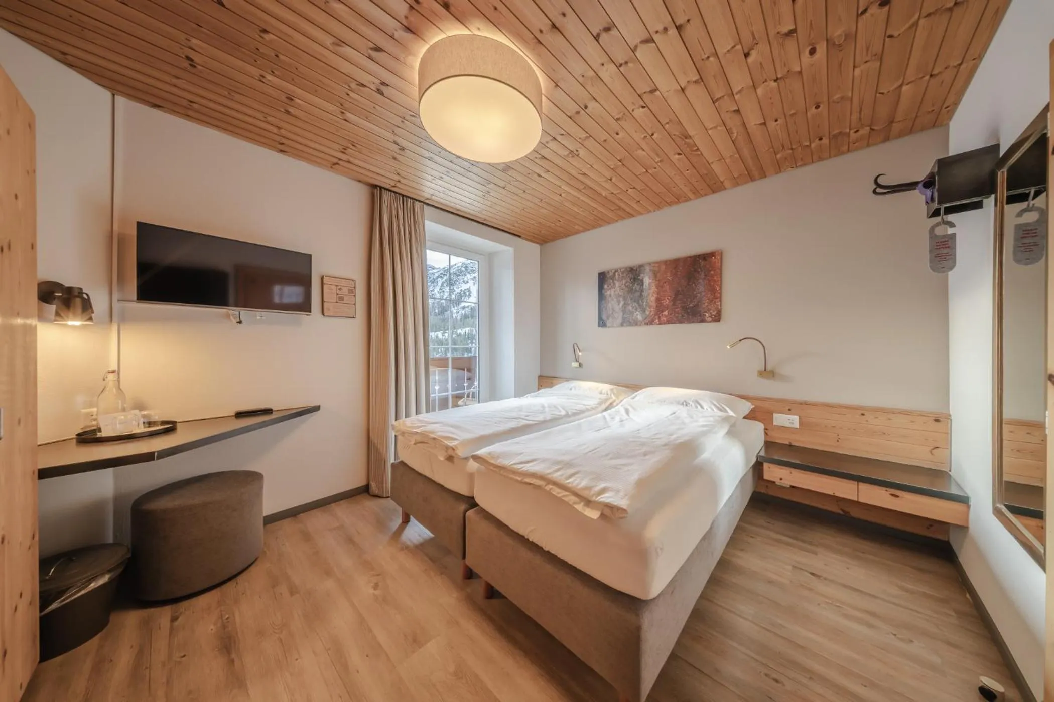 Photo of the whole room, Bed in Hotel Quellenhof - Self Check-in & Adults Only