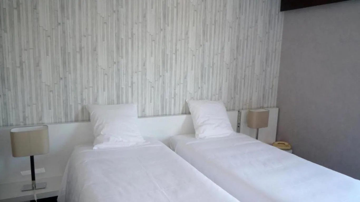 Bed in HYP'Hotel