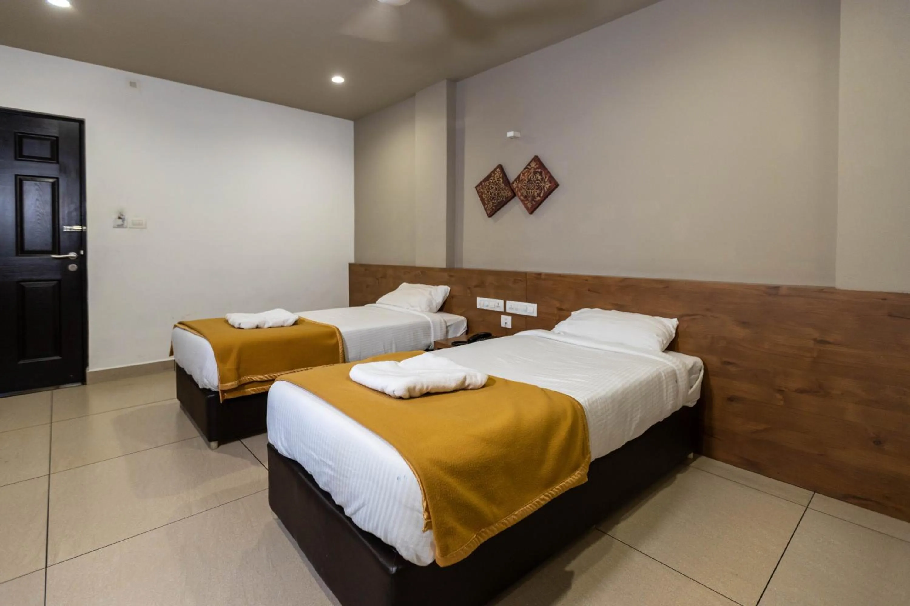 Bed in Aryaas Residency Nettoor