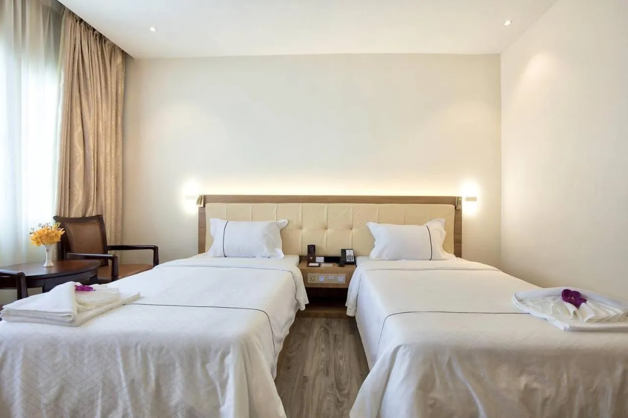 Bed in Le President Hotel