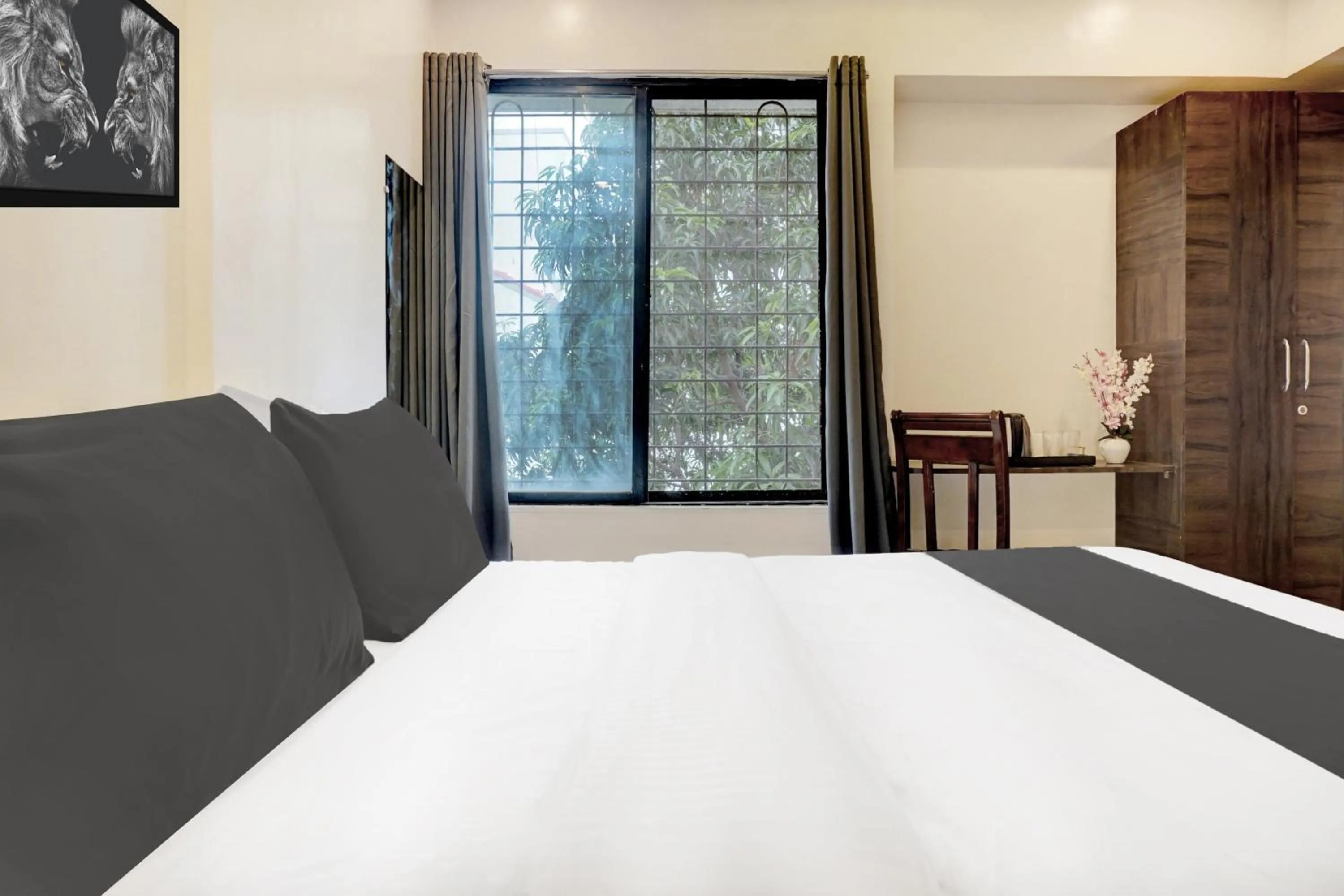 Bedroom, Bed in Super Hotel O Laxman Nagar Baner