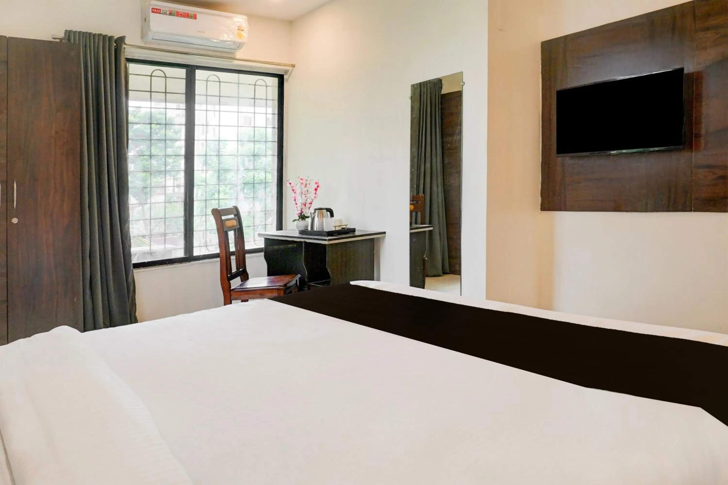Bedroom, Bed in Super Hotel O Laxman Nagar Baner