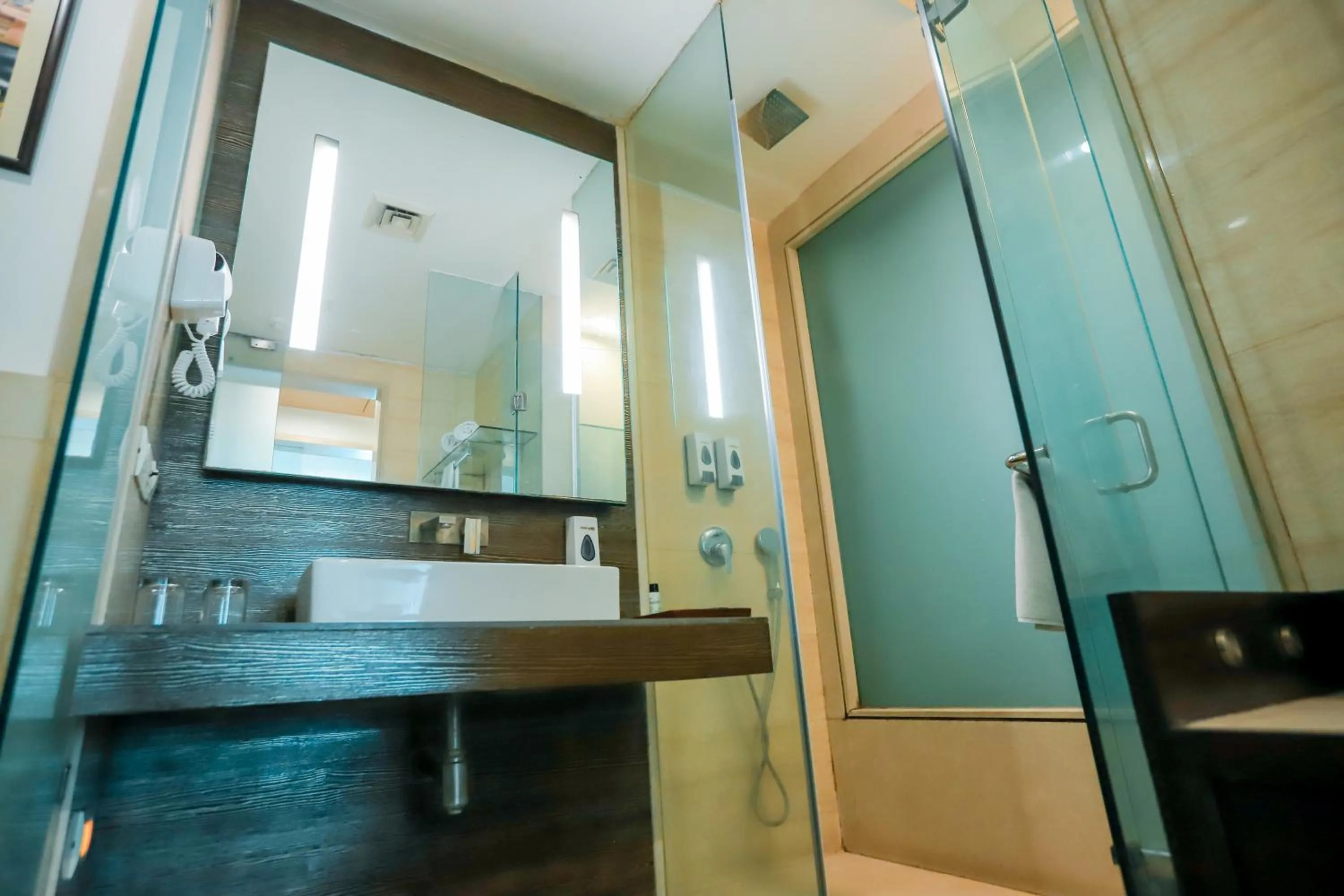 Shower in Bel-La Monde Hotel Chhattarpur South Delhi