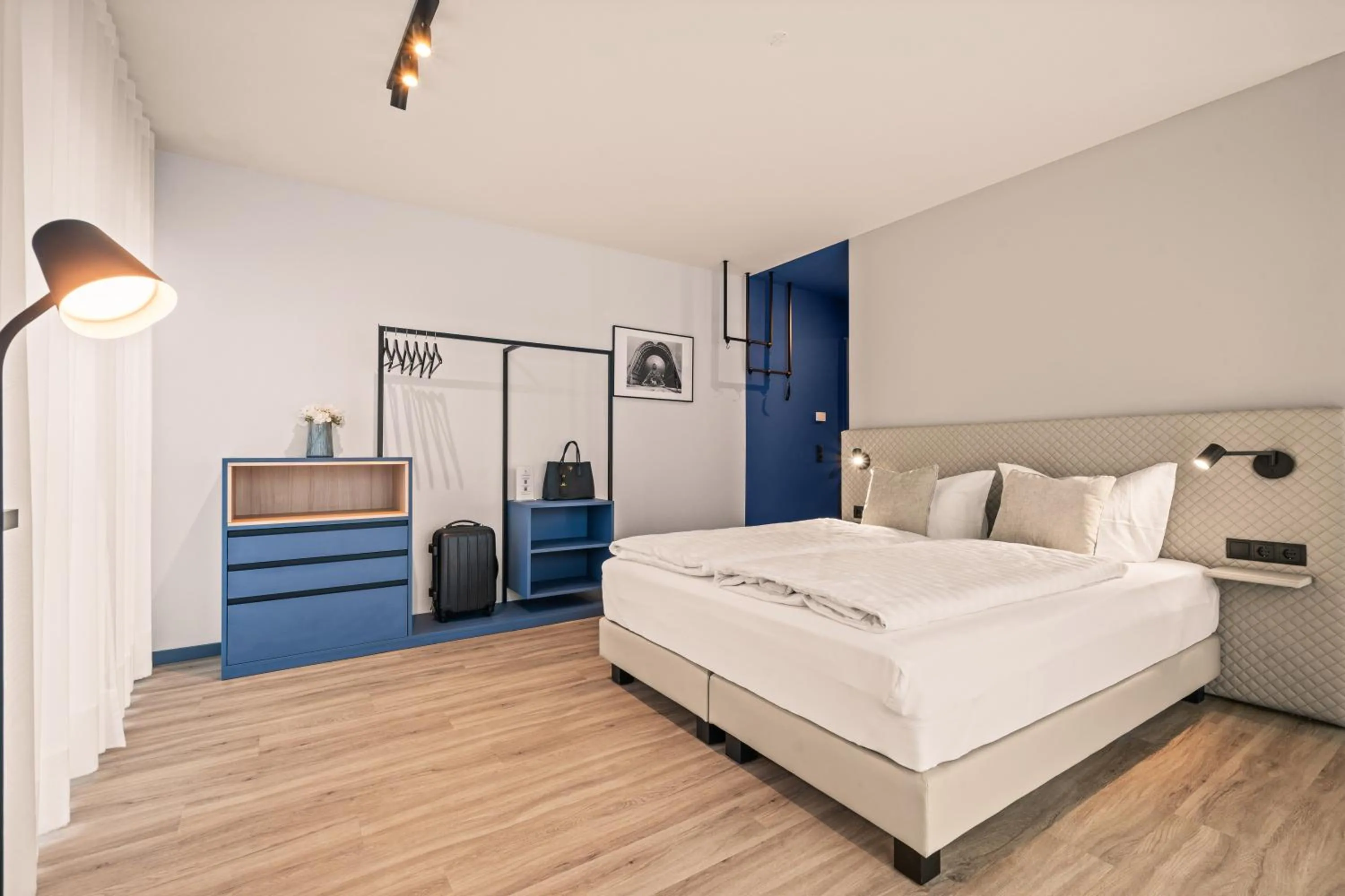 Bed in Motel42-Temporary Living