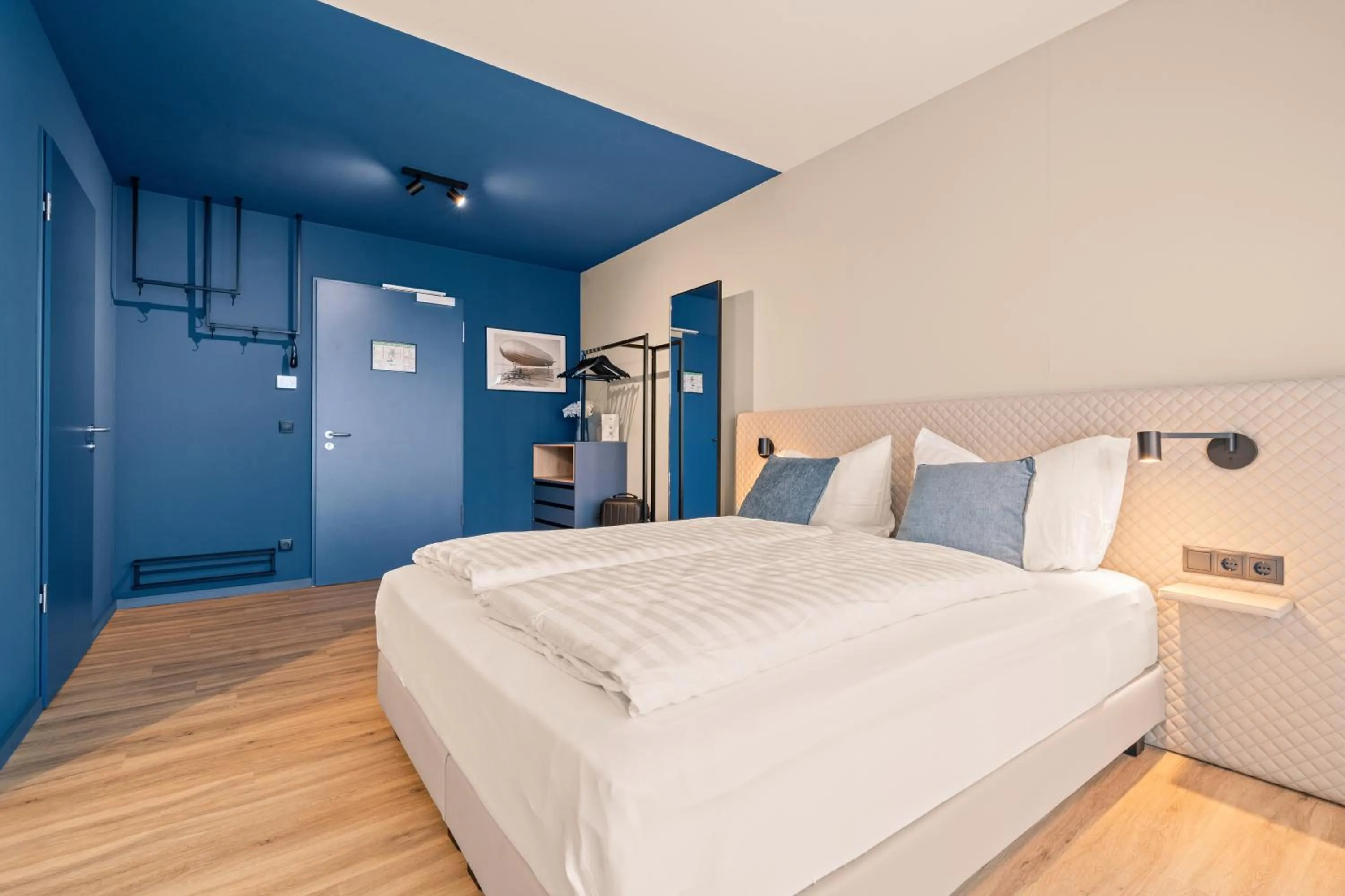 Bed in Motel42-Temporary Living