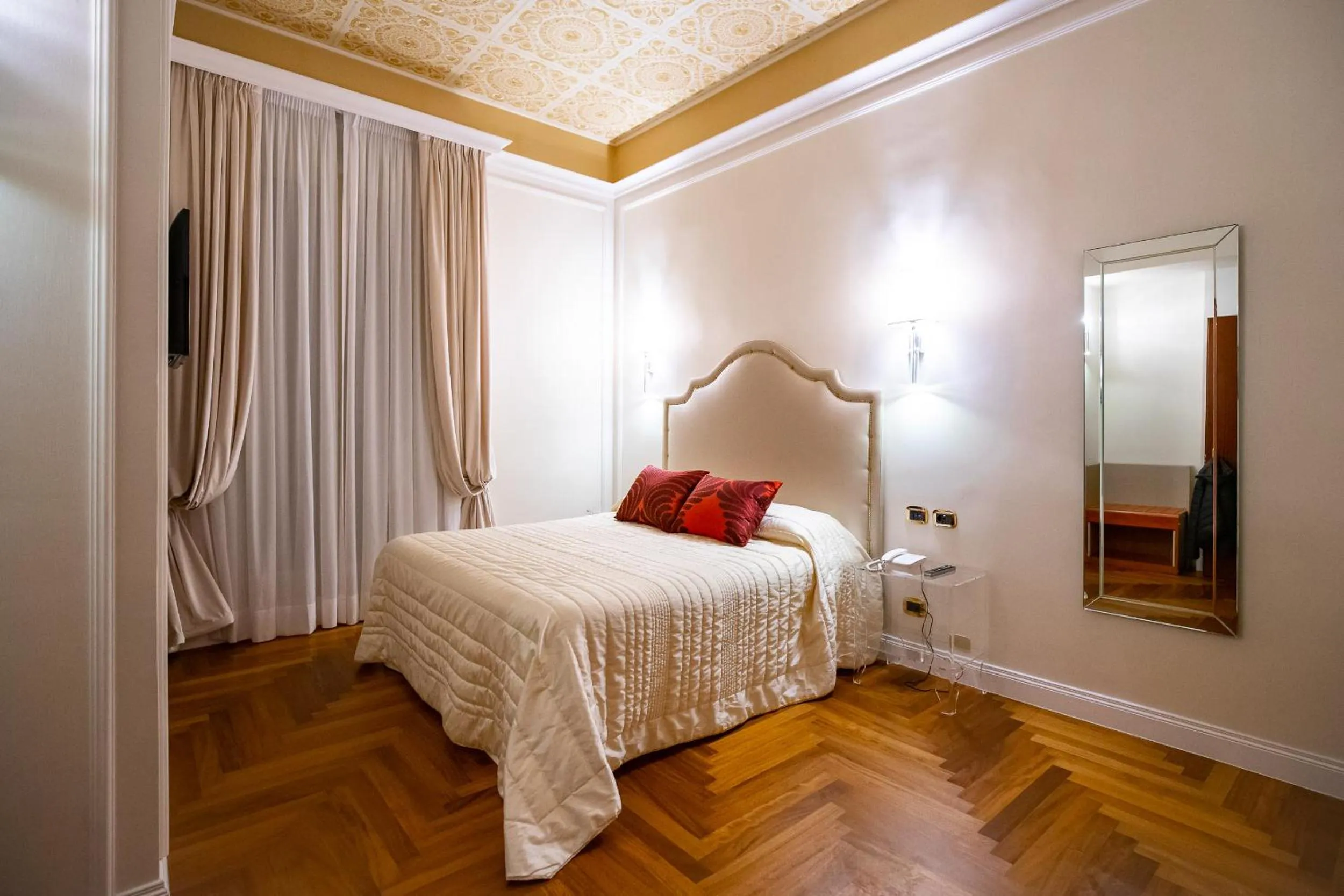 Bed in Boutique Hotel Puccini