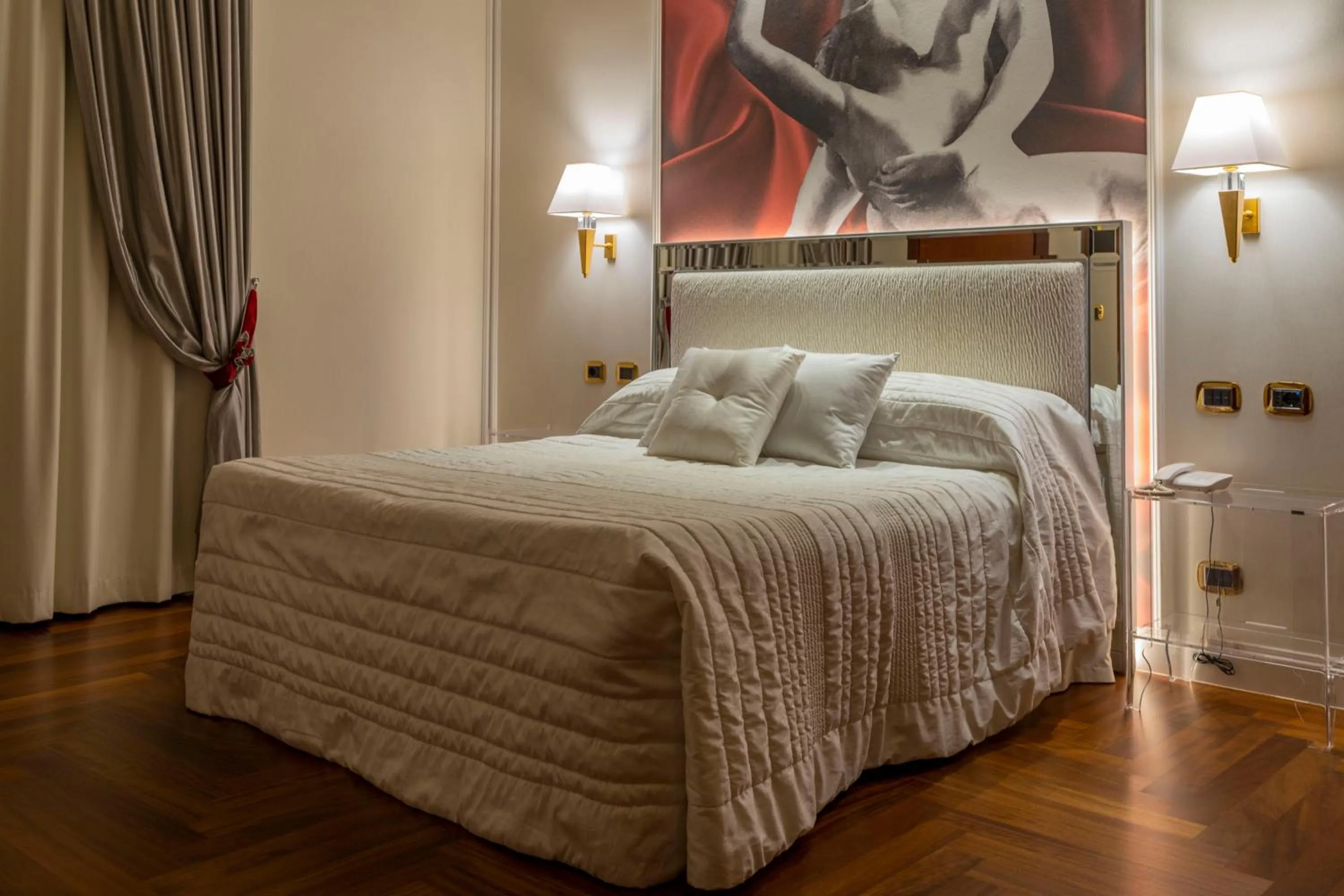 Bed in Boutique Hotel Puccini