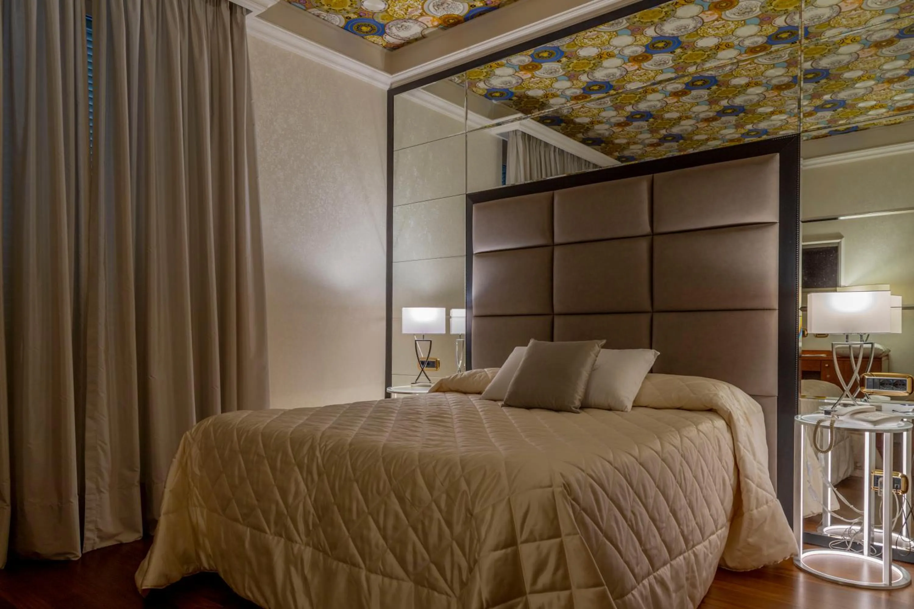 Bed in Boutique Hotel Puccini