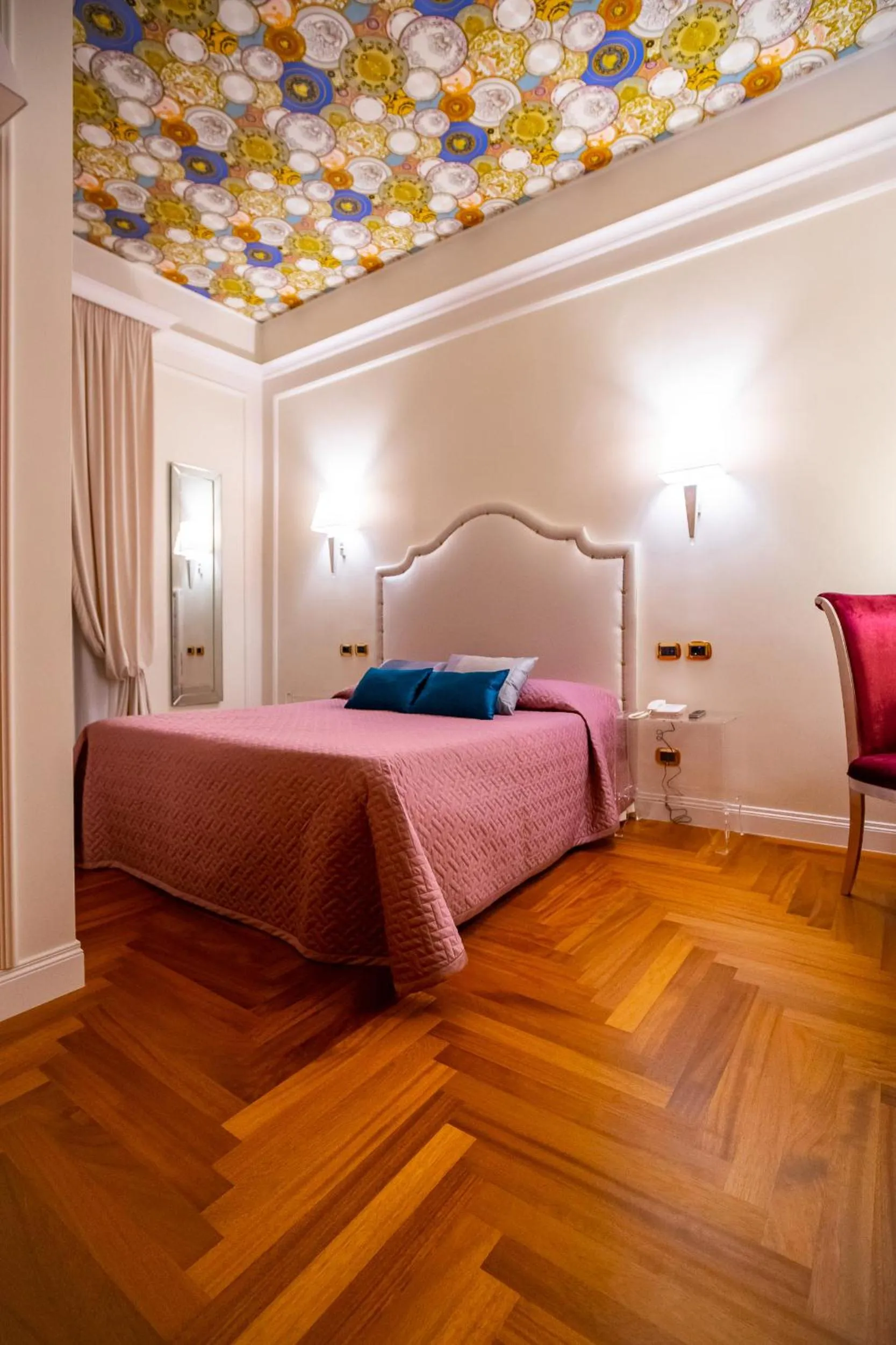 Bed in Boutique Hotel Puccini