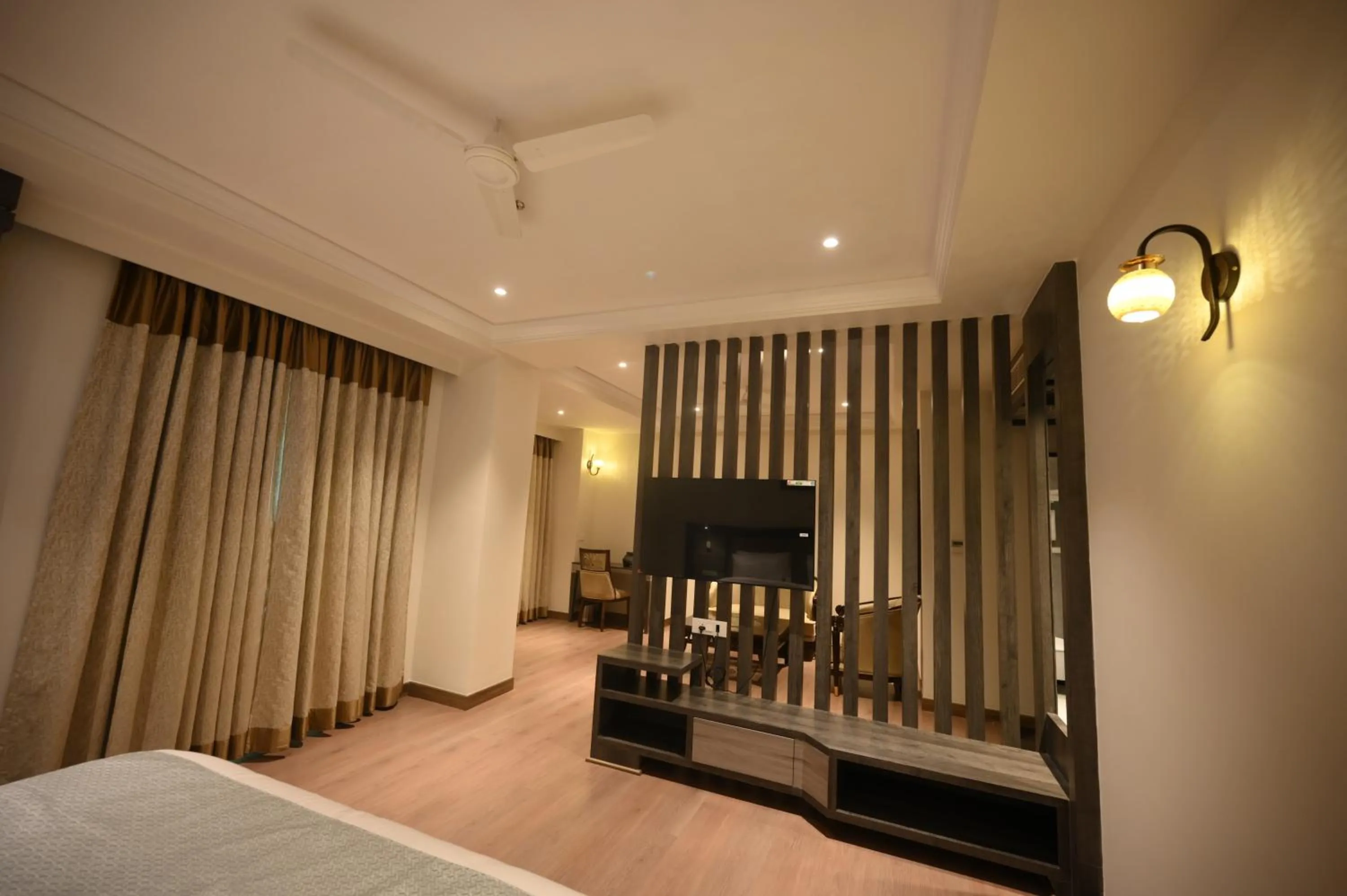 TV and multimedia, Bed in The Mudra Hotel