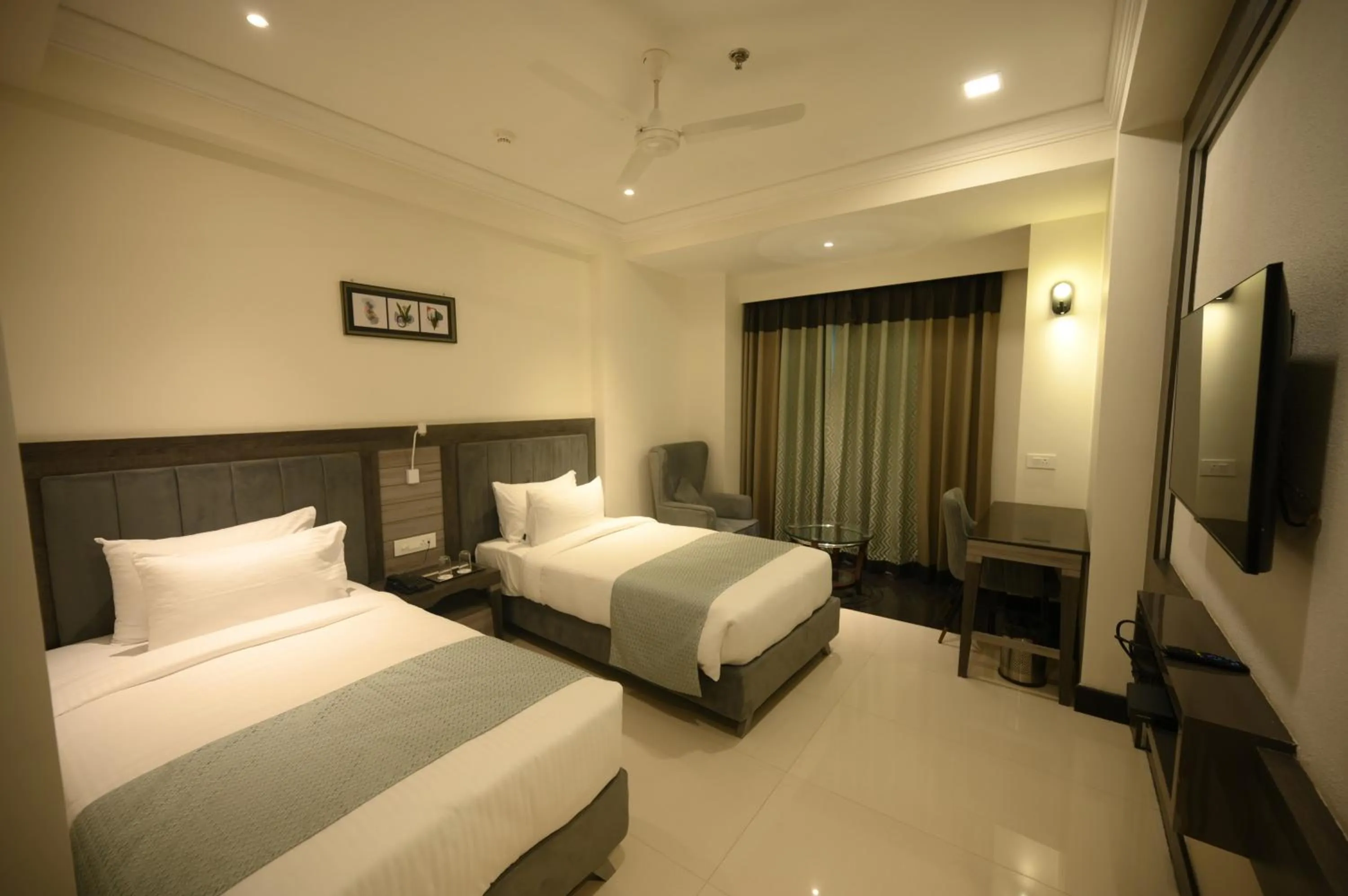 Bed in The Mudra Hotel
