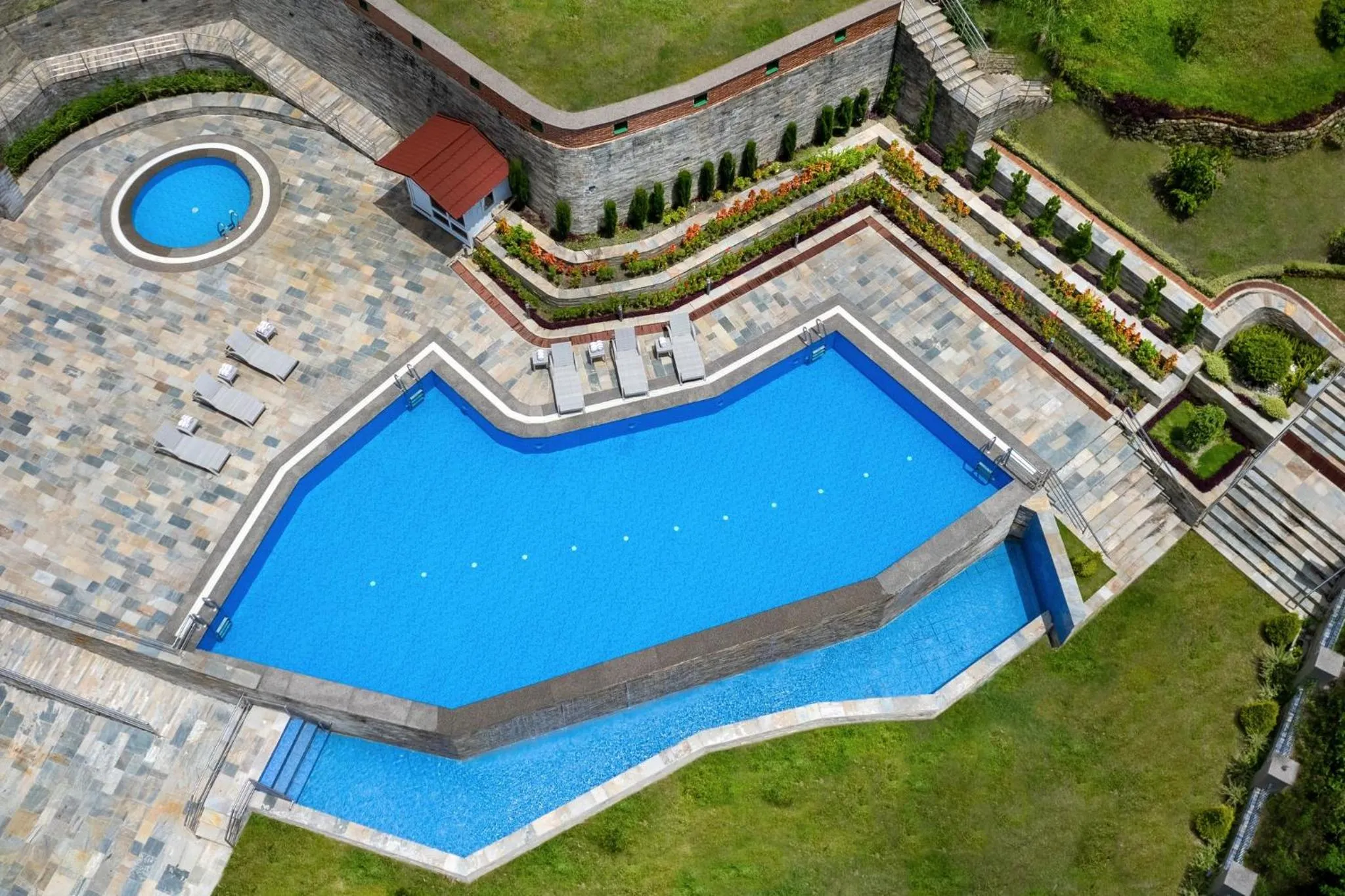 Swimming pool in Holiday Inn Resort Kathmandu Budhanilkantha by IHG