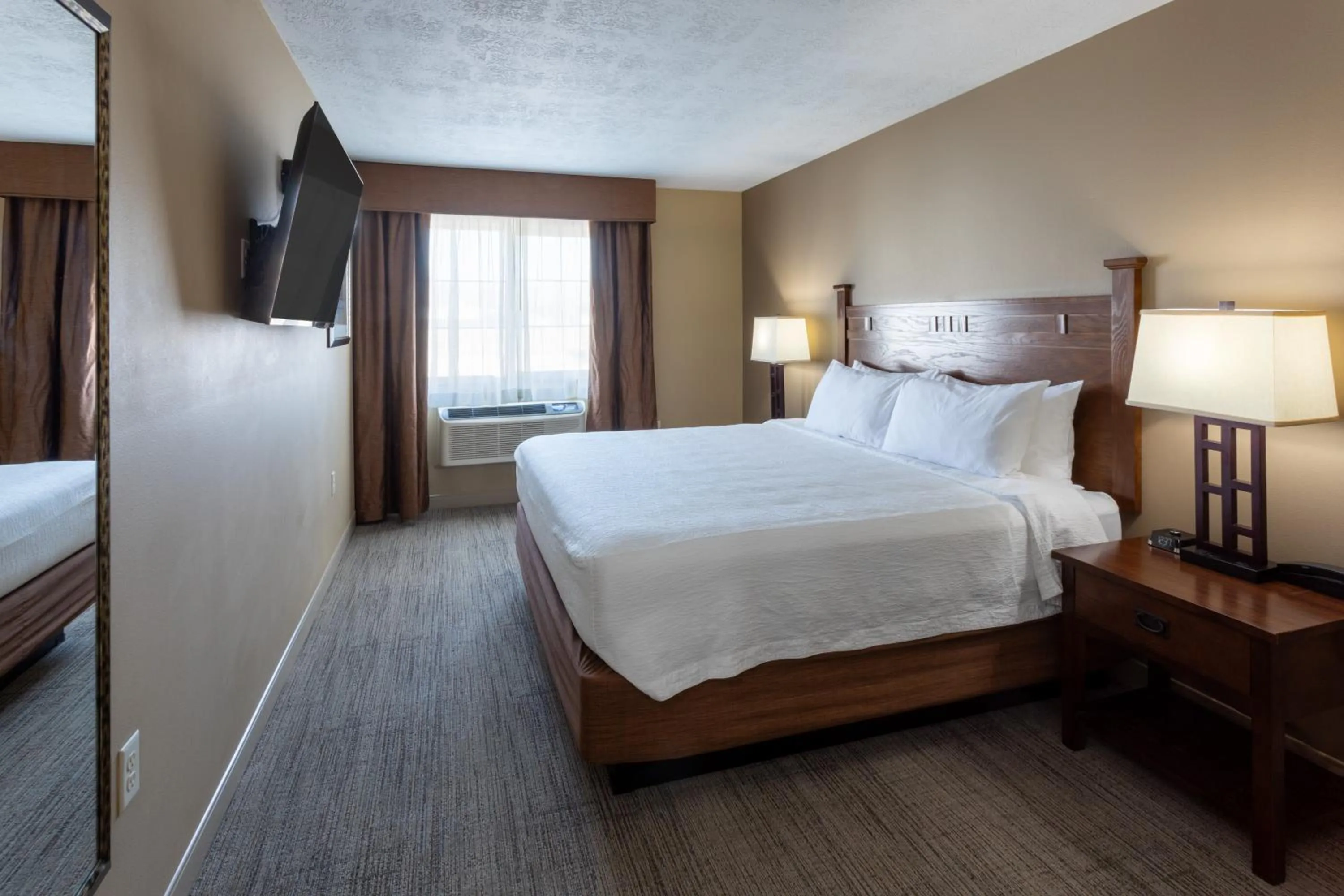 Bed in GrandStay Inn & Suites of Luverne