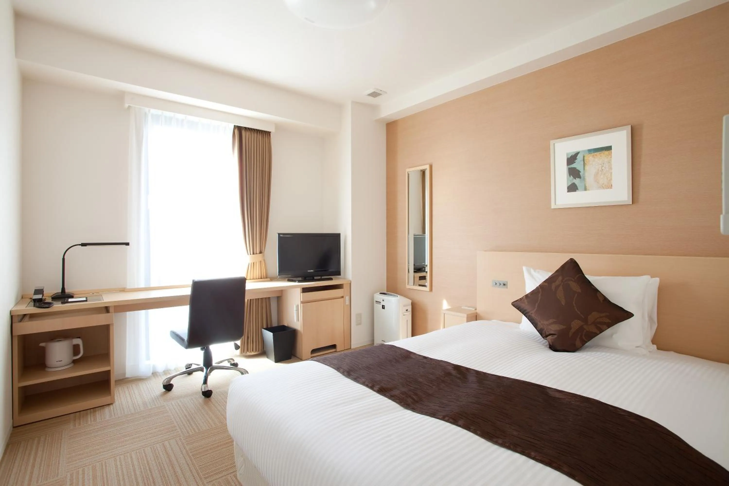 Photo of the whole room, Bed in Shizutetsu Hotel Prezio Shizuoka Ekinan