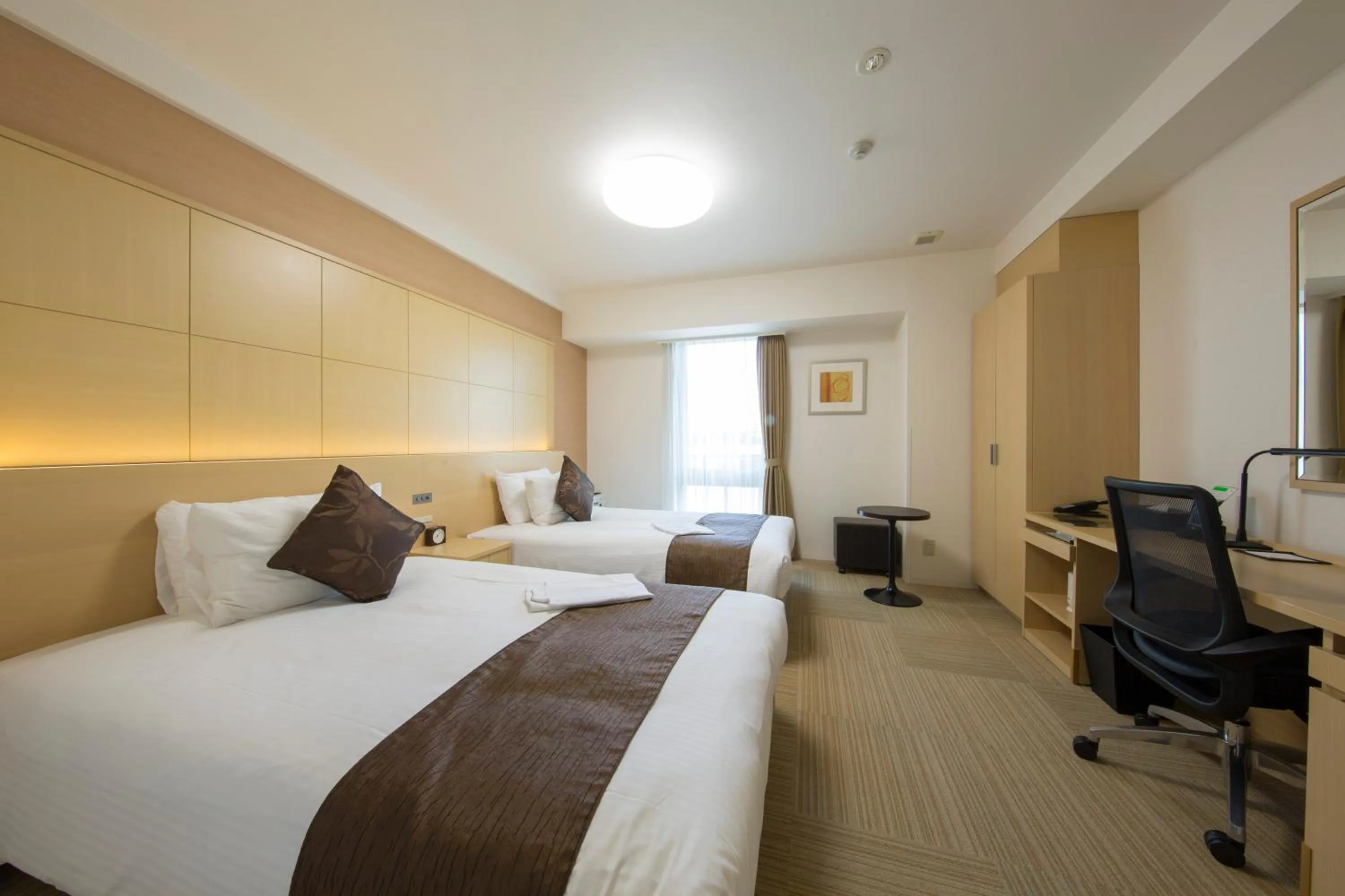 Bed in Shizutetsu Hotel Prezio Shizuoka Ekinan