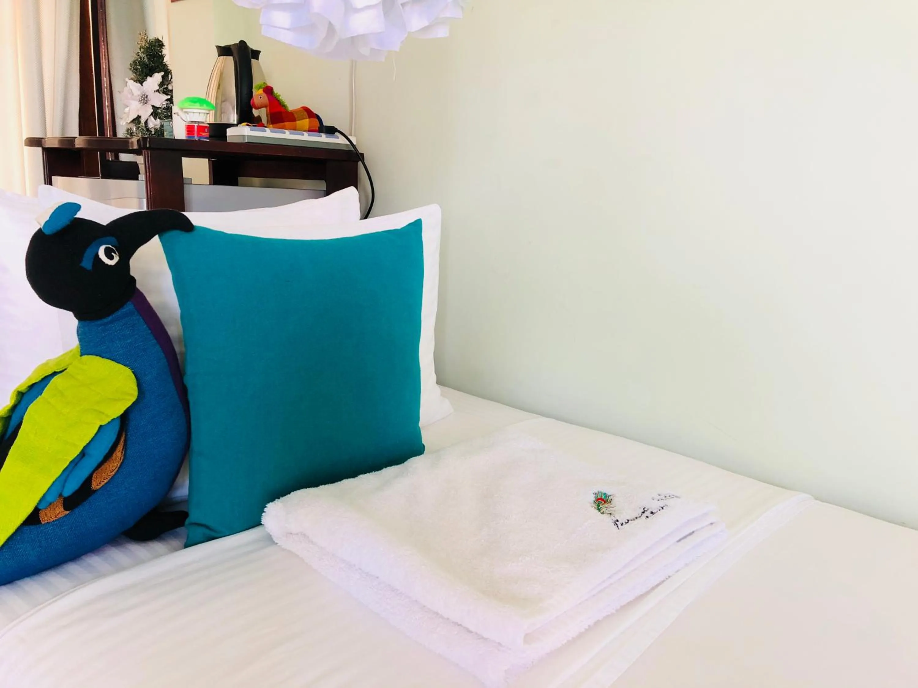 Bed in Peacock Villa