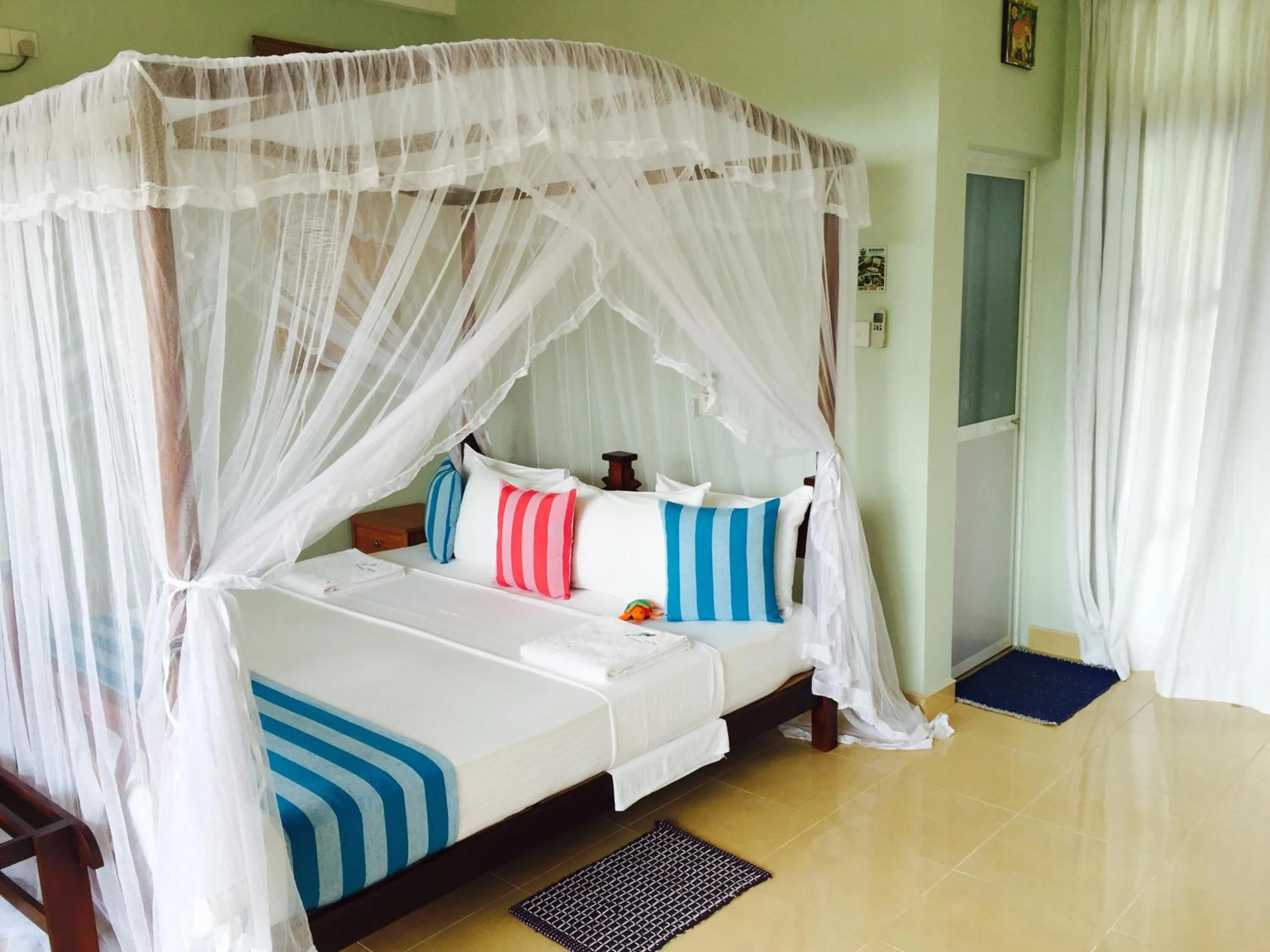 Bed in Peacock Villa
