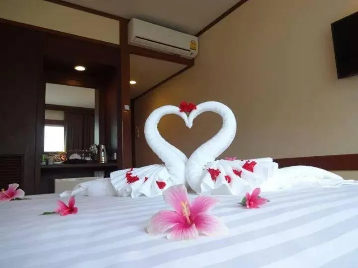 Photo of the whole room, Bed in Isle Beach Resort Krabi-SHA